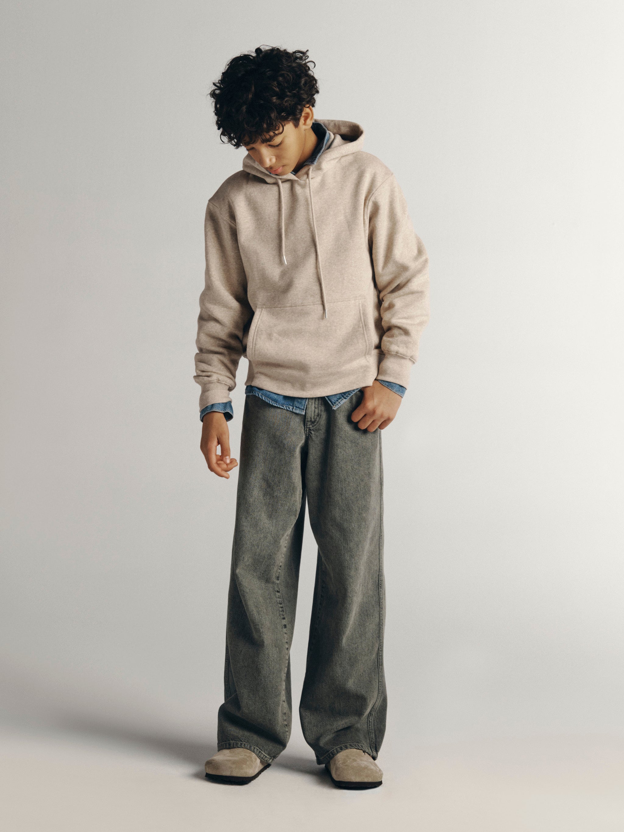 DL1961 Kids boys' Mason wide-leg jeans in Character Green with an oatmeal hoodie, full-length front view in a studio.