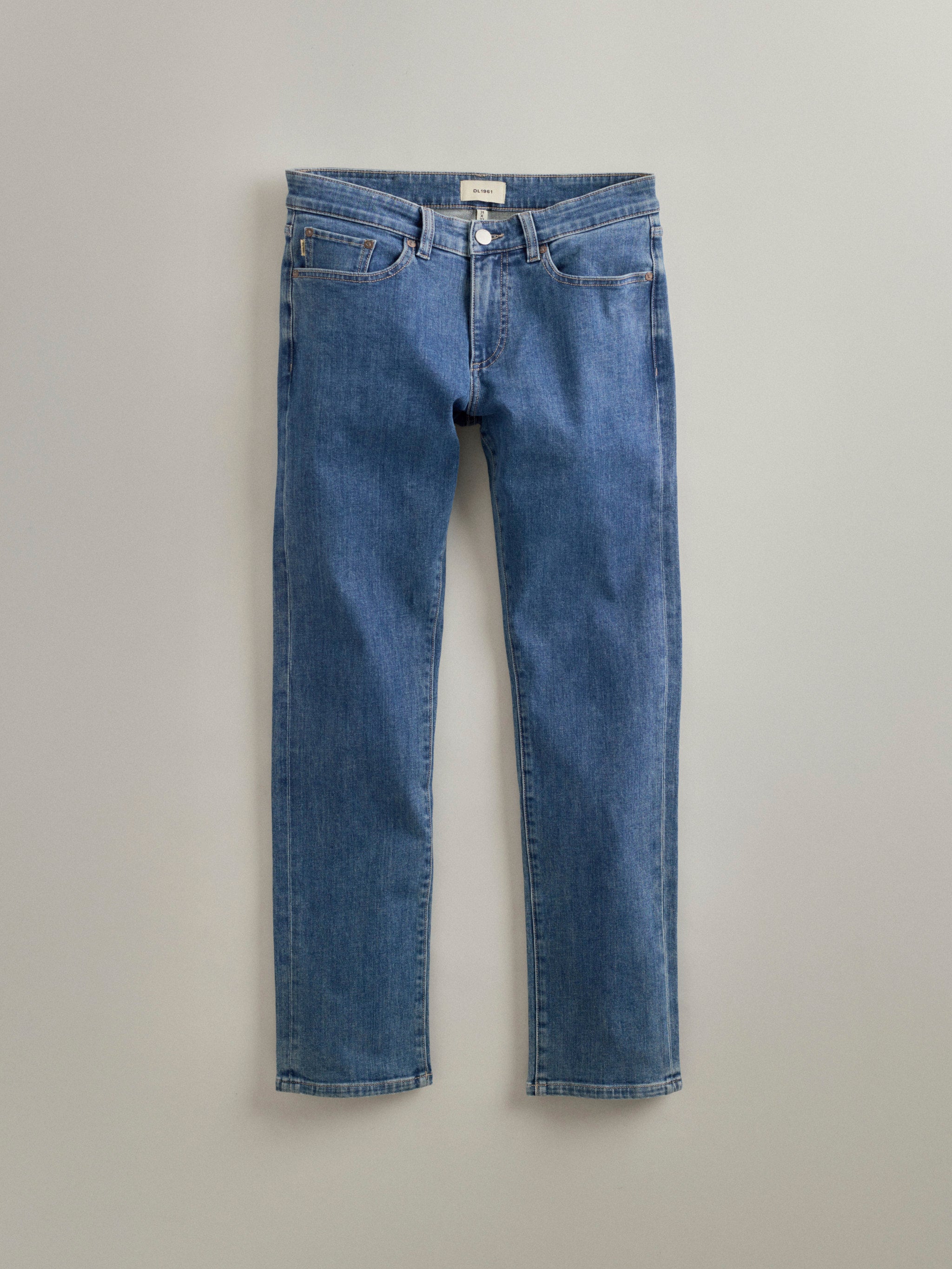 DL1961 men's jeans in medium blue 'Highland Park', flat lay front view.