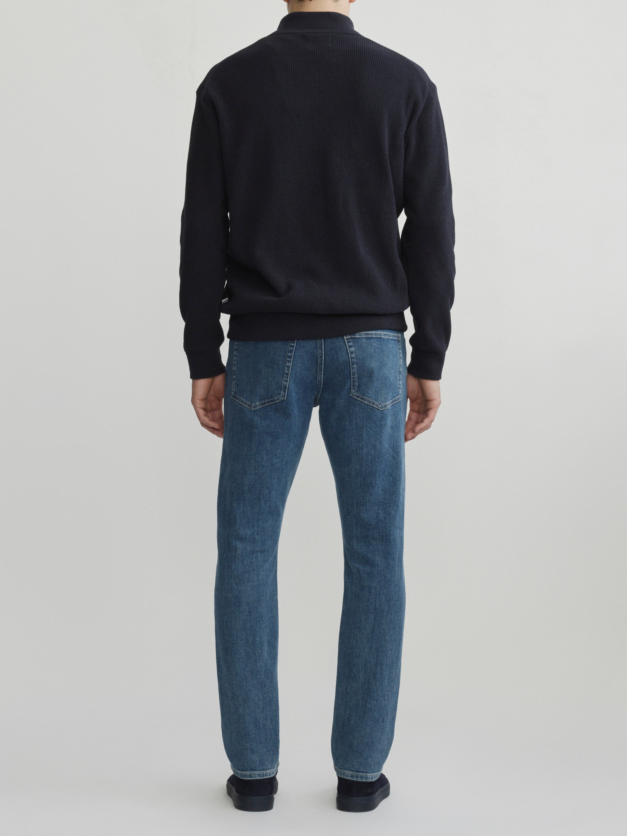 DL1961 men's Russell Slim Straight jeans in medium blue 'Highland Park', back view showing the rear pockets.
