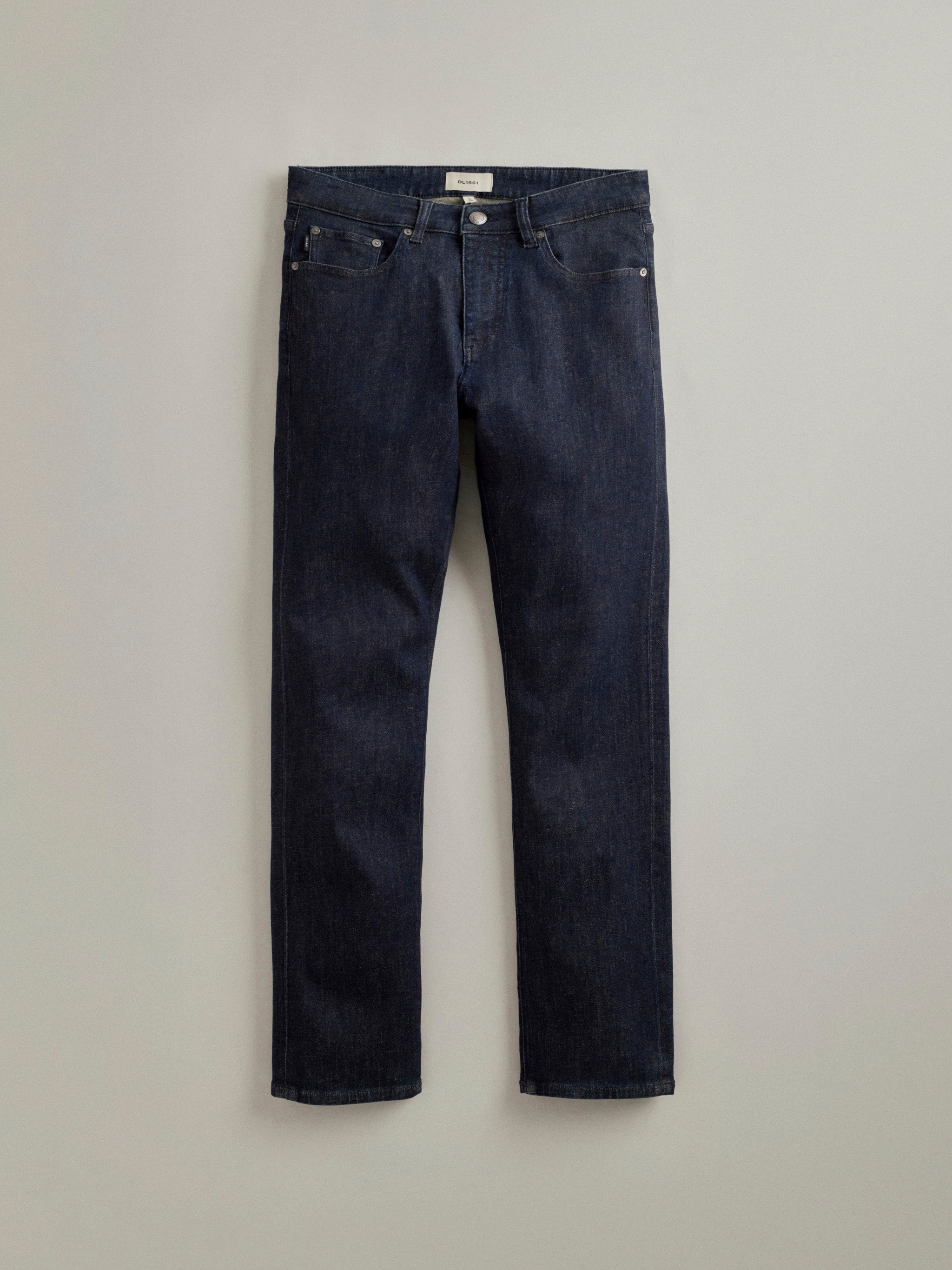 DL1961 men's jeans in dark indigo 'Crescent Harbor', flat lay front view.