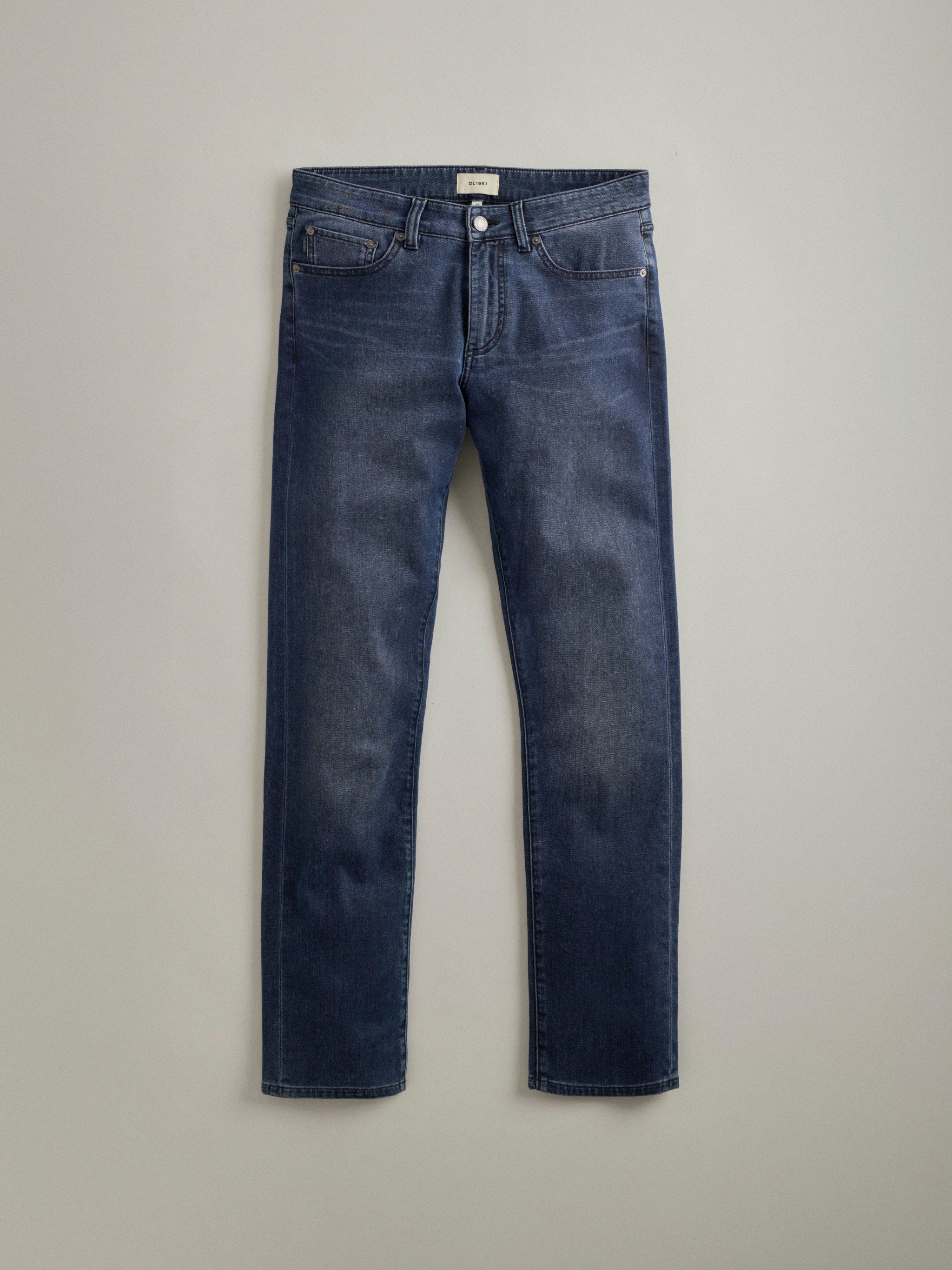 DL1961 men's jeans in dark blue-grey 'Cold Forge', flat lay front view.