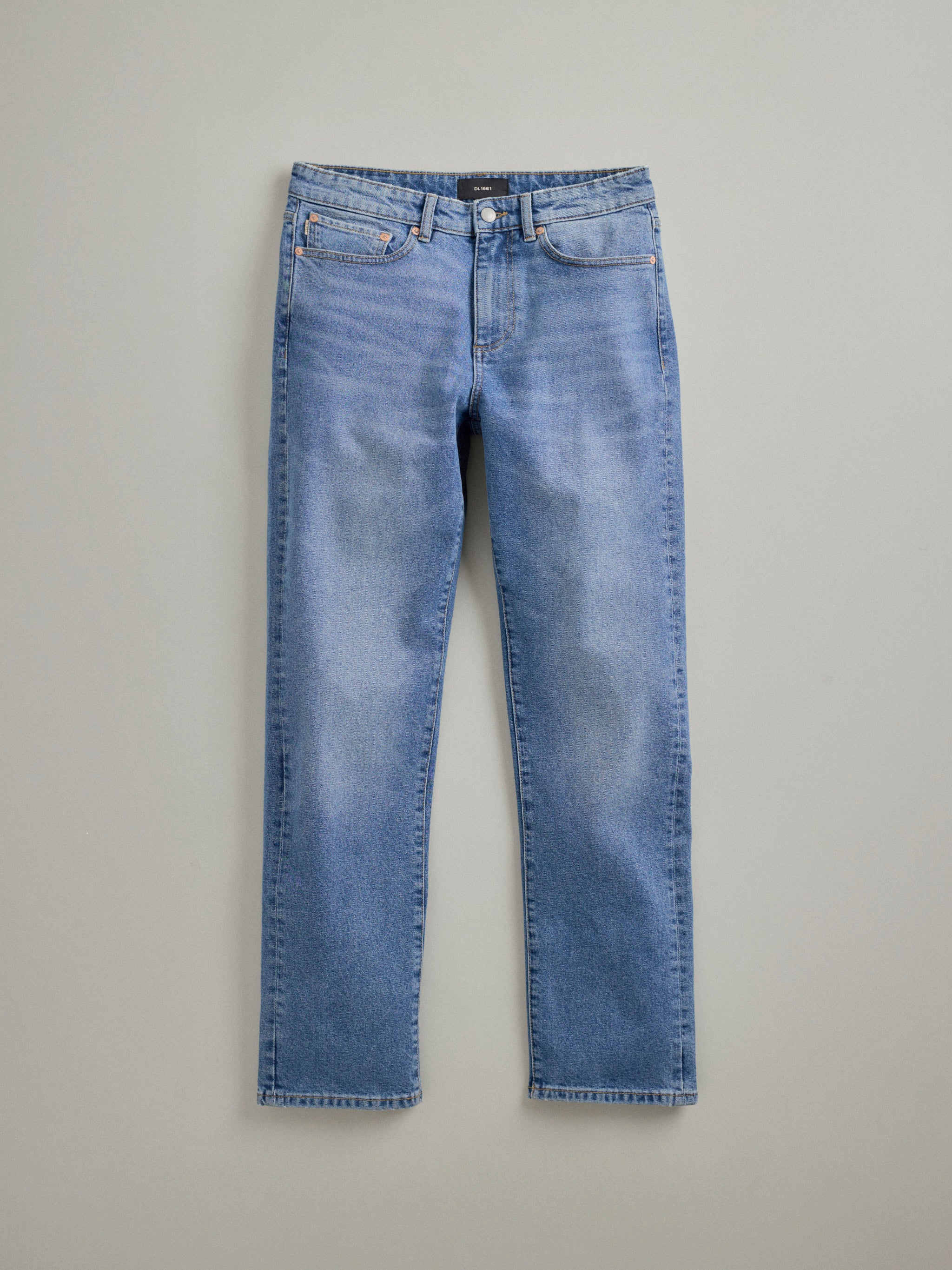 DL1961 men's Chris Modern Straight jeans in light blue 'Stonecut', flat lay front view.