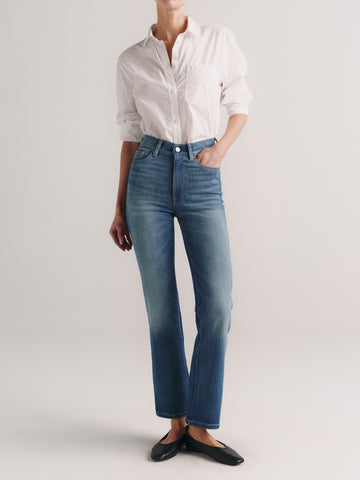 DL1961 women's Halle Straight High-Rise jeans in medium blue 'Palm Springs Clean', front view on model.