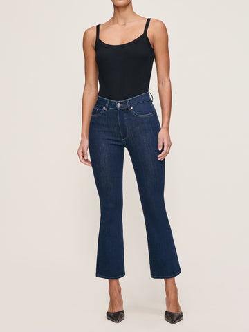 DL1961 Bridget Boot high-rise cropped bootcut jeans in dark indigo 'Lunar Sky' wash, front view with black ribbed tank.