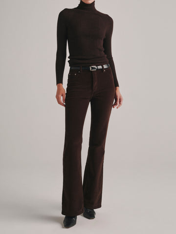DL1961 Bridget Boot High Rise corduroy jeans in dark brown 'Meteorite', front view with black turtleneck.
