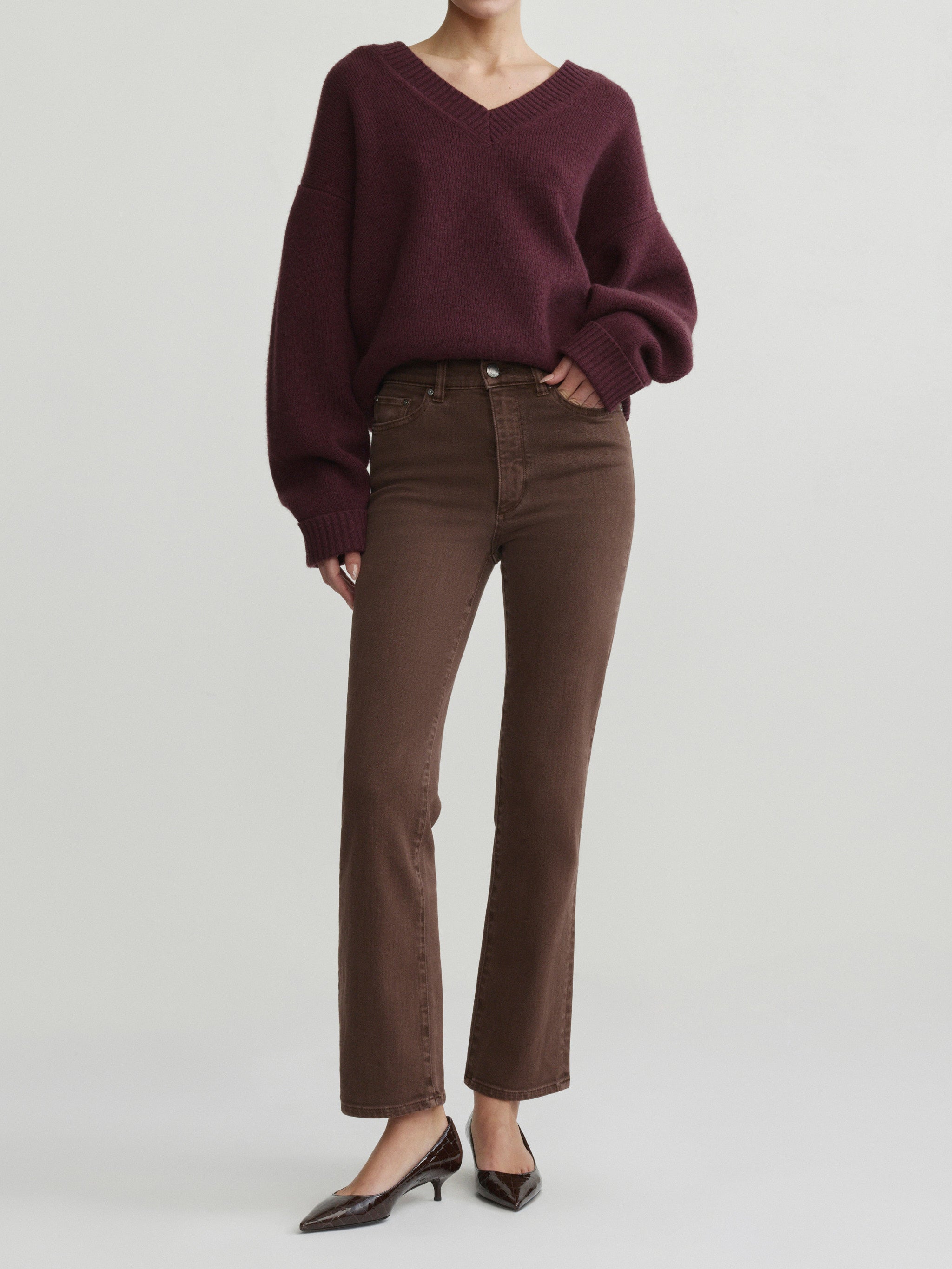 Halle Straight jeans in Brownstone with Robbie Sweater in Cacao on a model, full-length front view in studio.