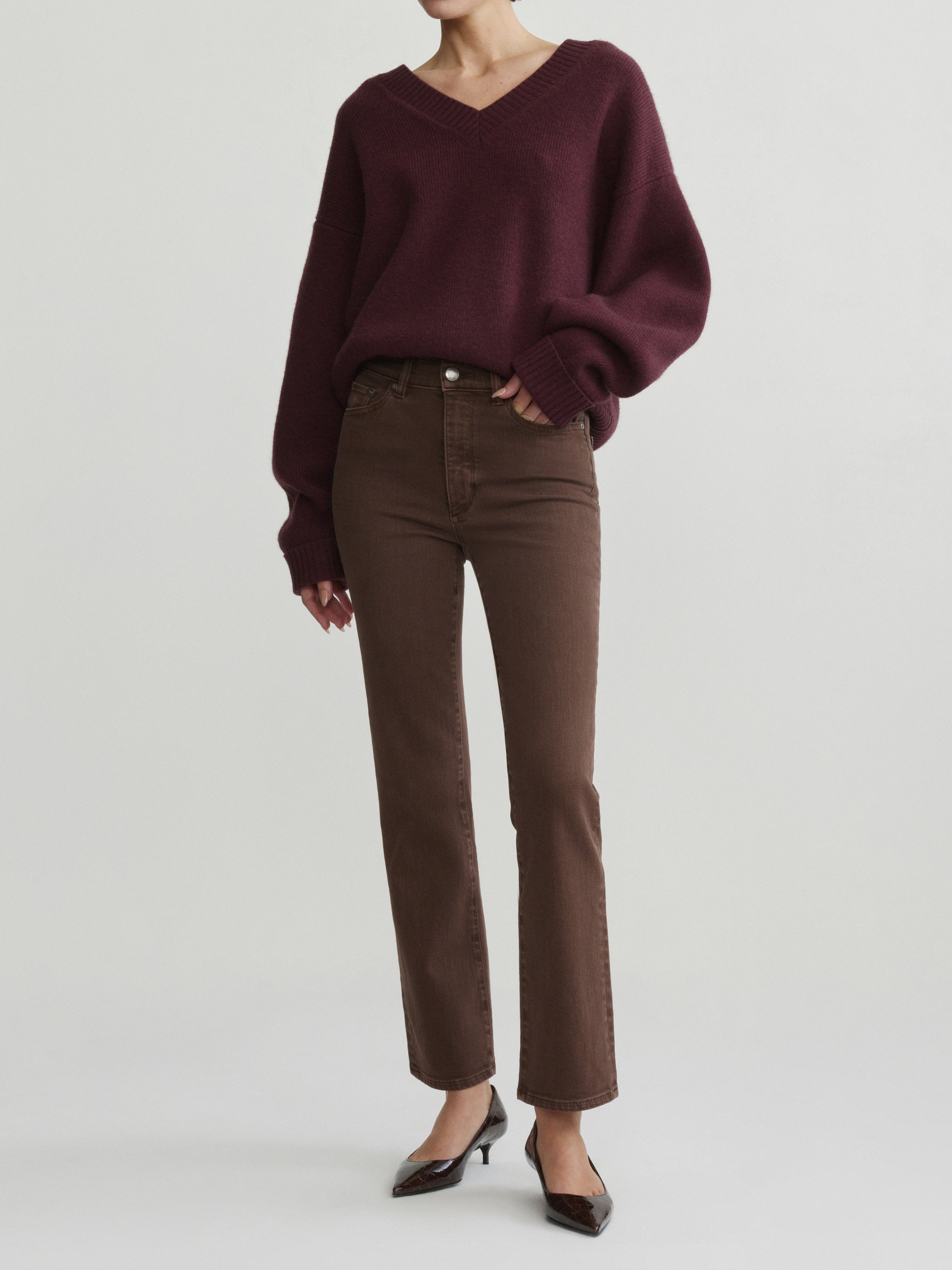 Halle Straight jeans in Brownstone with Robbie Sweater in Cacao on a model, full-length front view in studio.