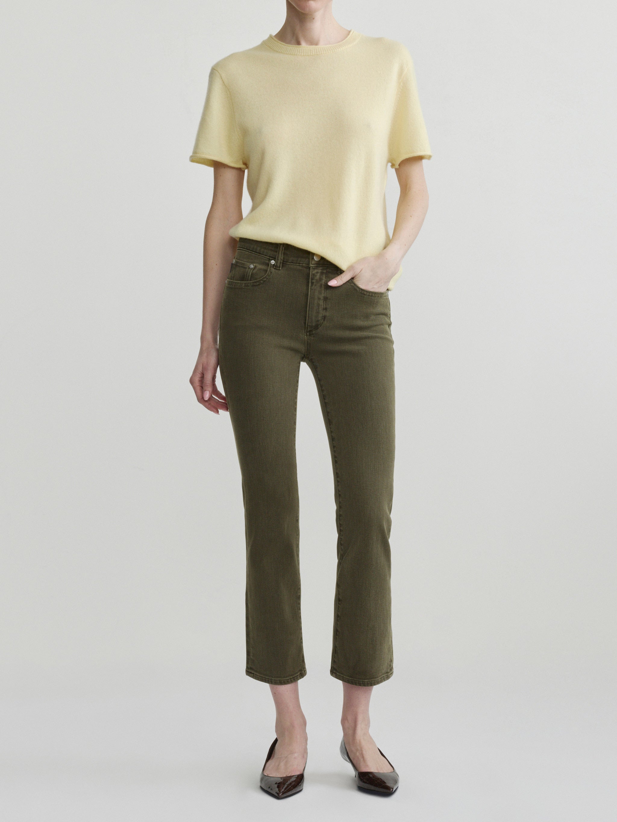 Mara Straight jeans in Pine with Knit Tee in Moonlight on a model, full-length front view in studio.