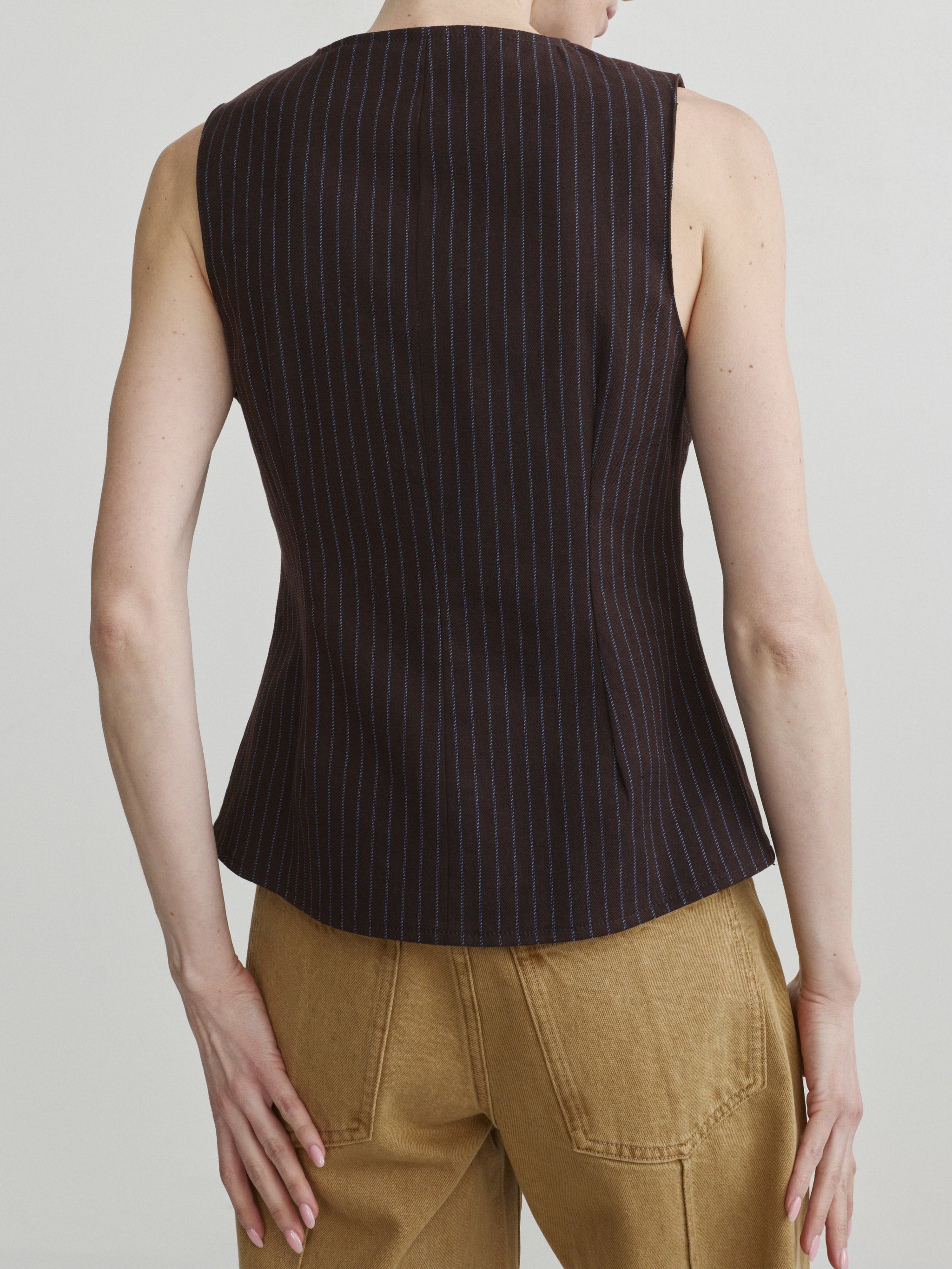 Kaylen Soft Curve jeans in Savannas with the Amalie Top in Brown Blue Stripe, front portrait crop on model.