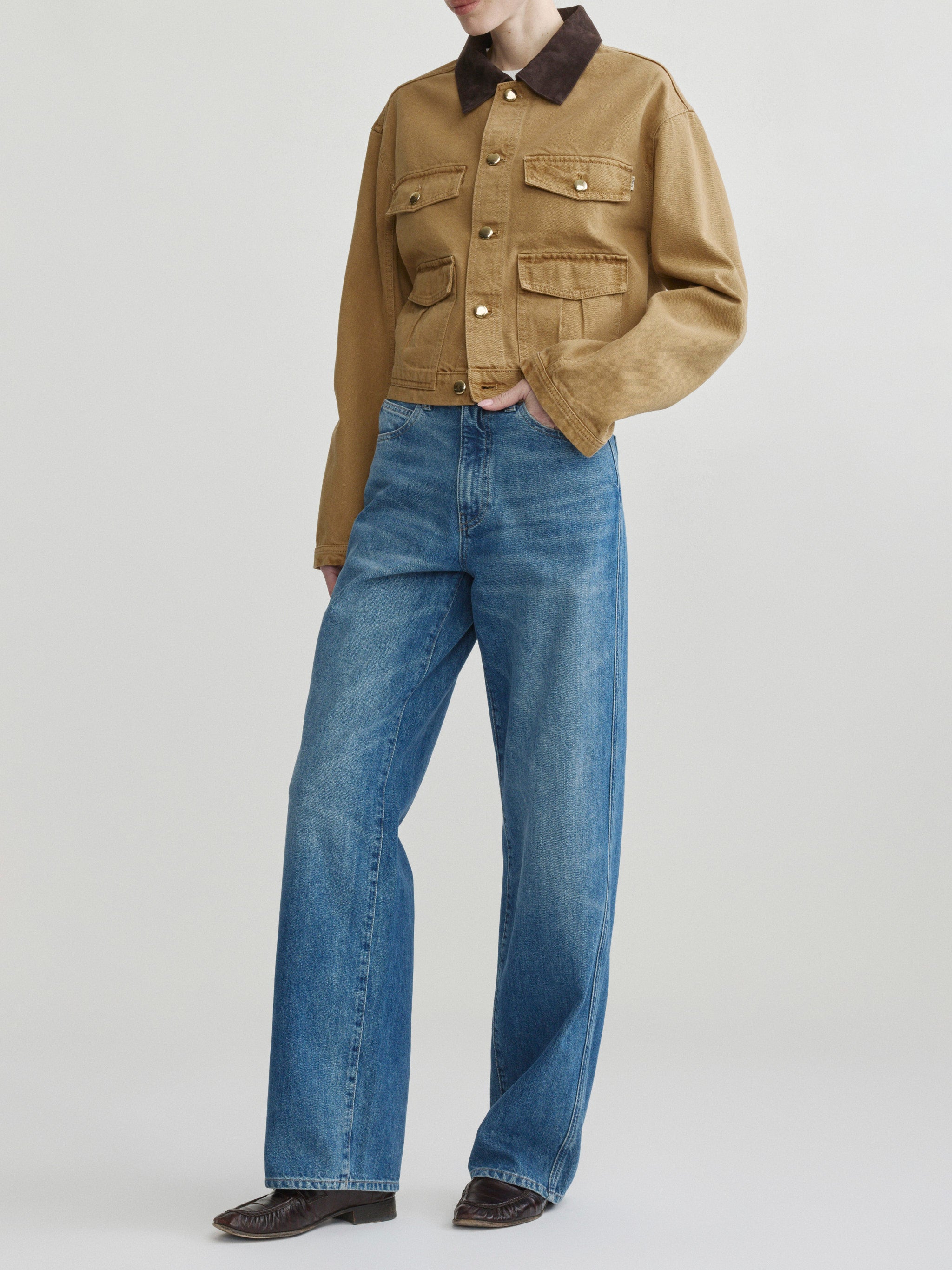 Kaylen Soft Curve jeans in Authentic with the Boxy Denim Jacket in Savannas, three-quarter front view on model.