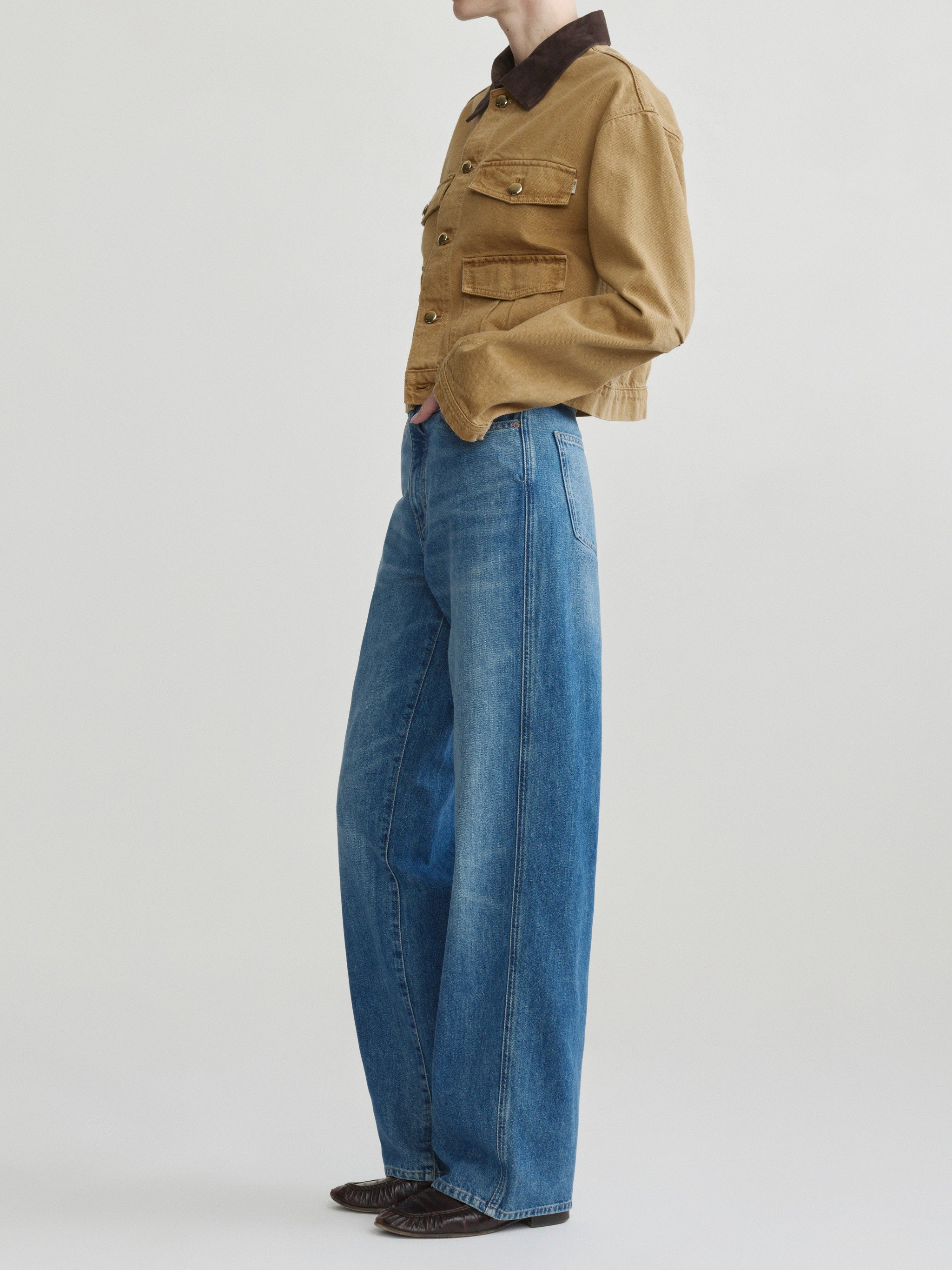 Kaylen Soft Curve jeans in Authentic with the Boxy Denim Jacket in Savannas, side view on model in studio.