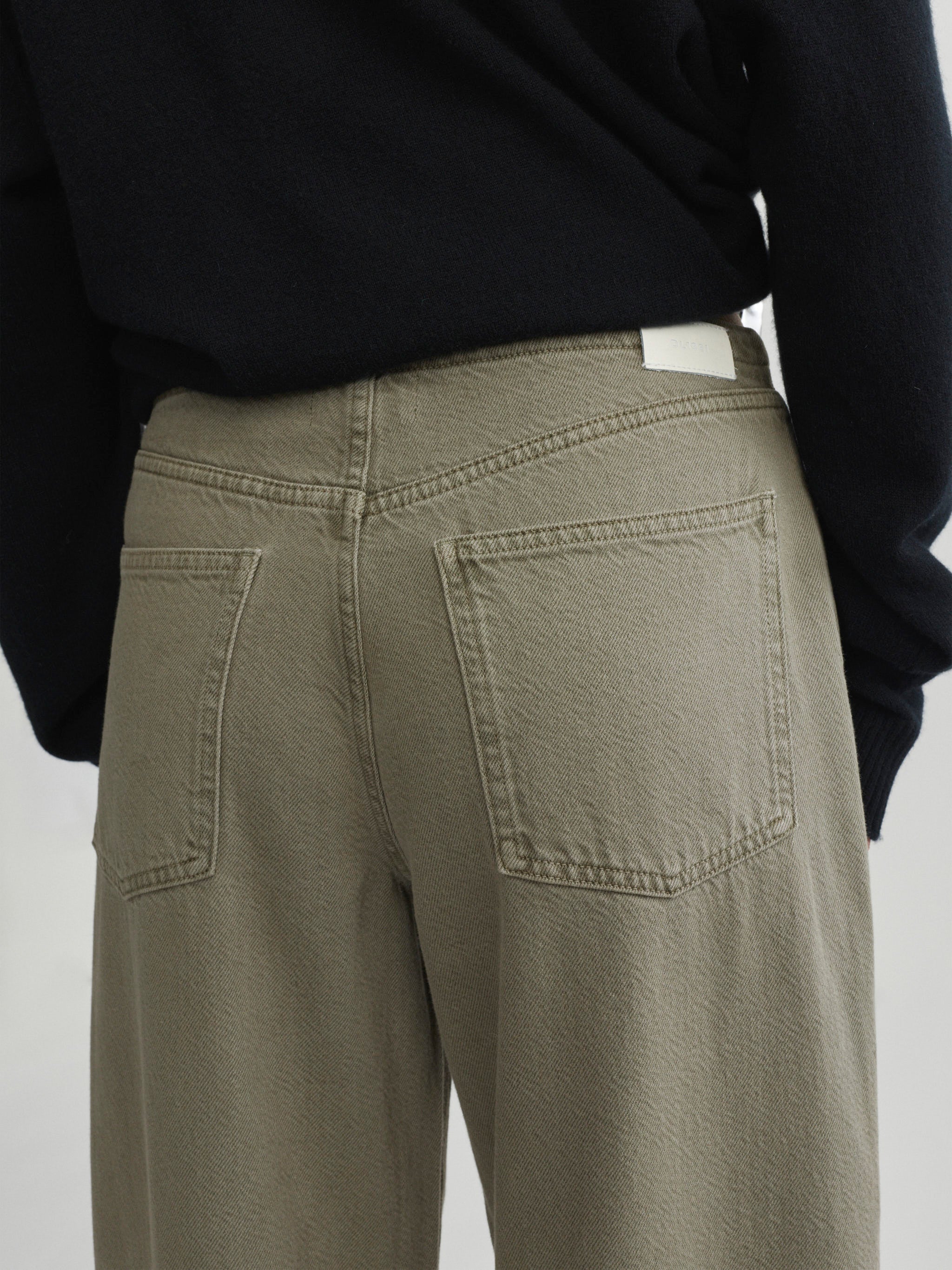 Sienna Low-Slung Wide Leg jeans in Clover Aura, close-up of back pockets and fabric detail.