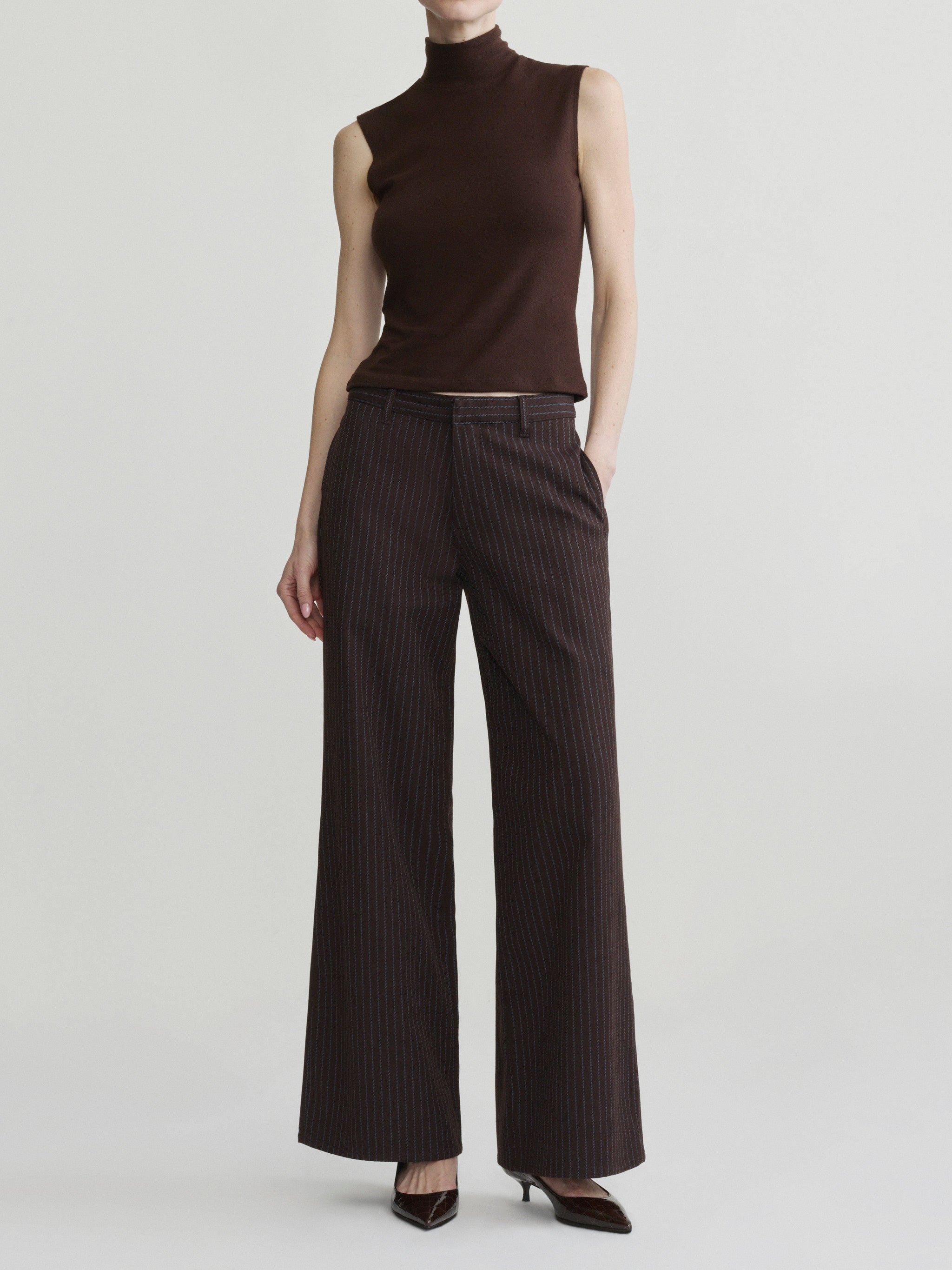 Alex Baggy Wide Leg jeans in Brown Blue Stripe on a model in brown mock-neck top, full-length front view.