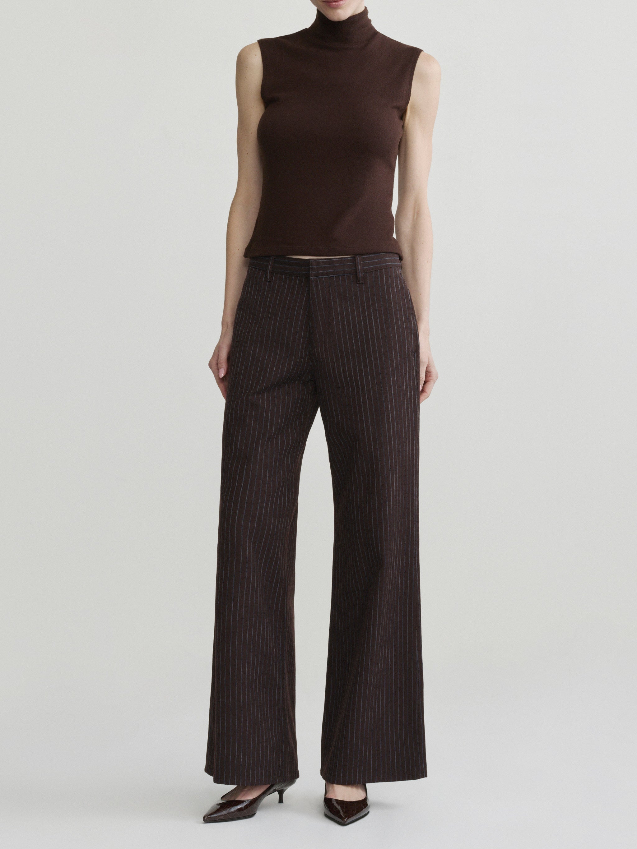 Alex Baggy Wide Leg jeans in Brown Blue Stripe on a model in brown mock-neck top, full-length front view.