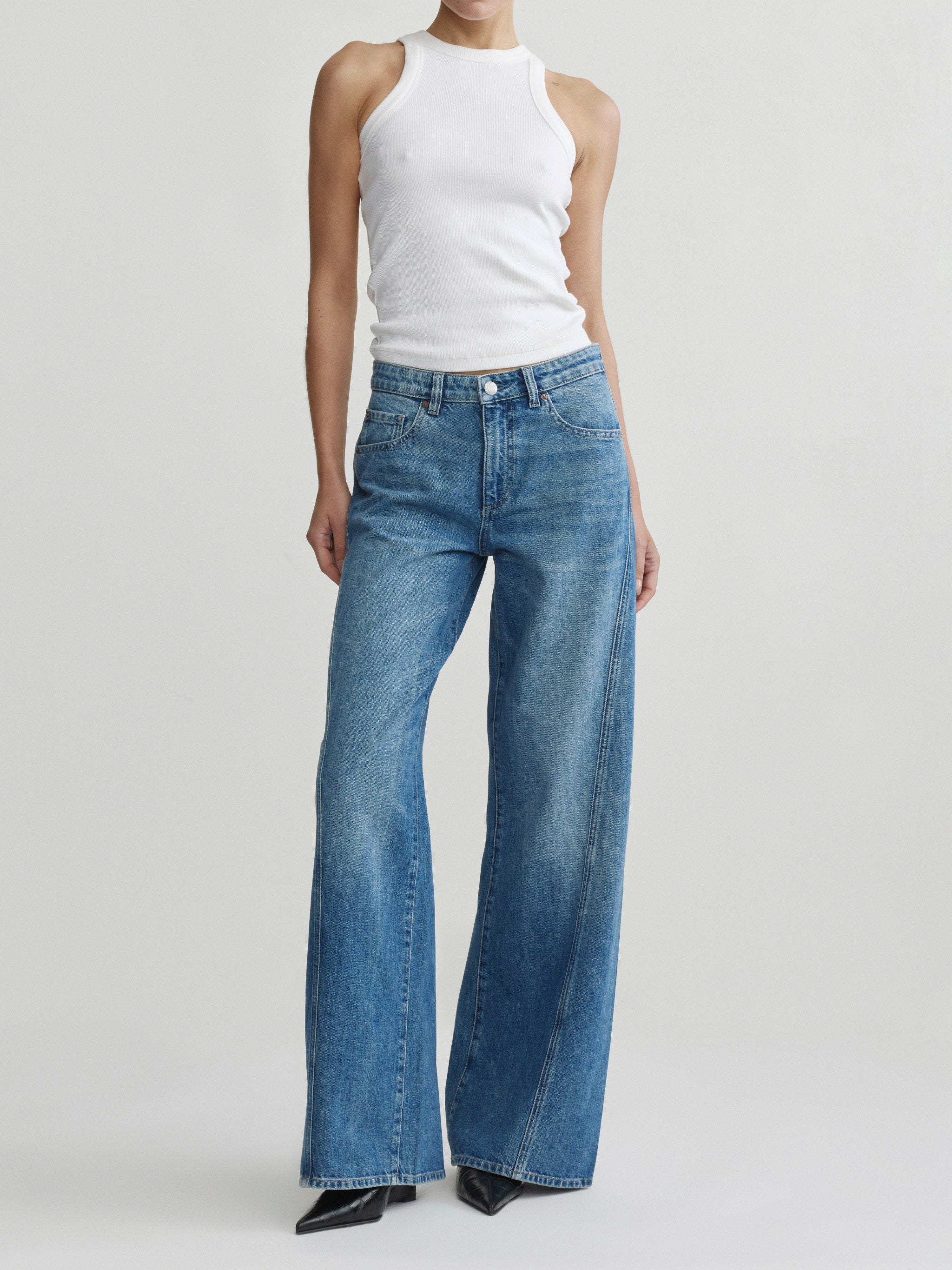 Alex Baggy Wide Leg jeans in Authentic on a model in white tank top, full-length front view.