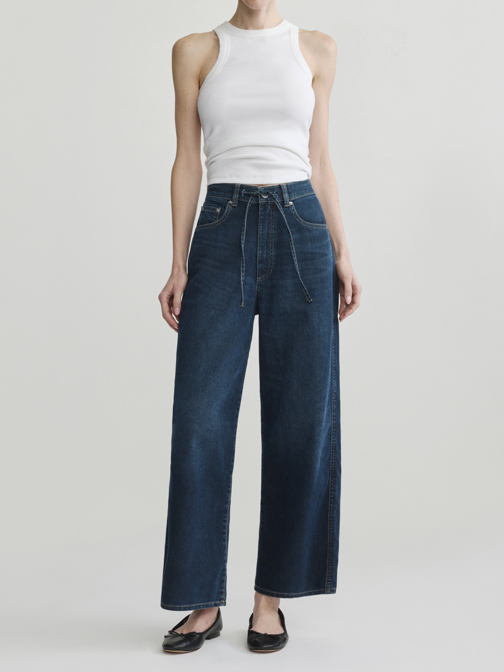 Taylor Relaxed Barrel jeans in Jazz Aura on a model in white tank top, full-length front view.