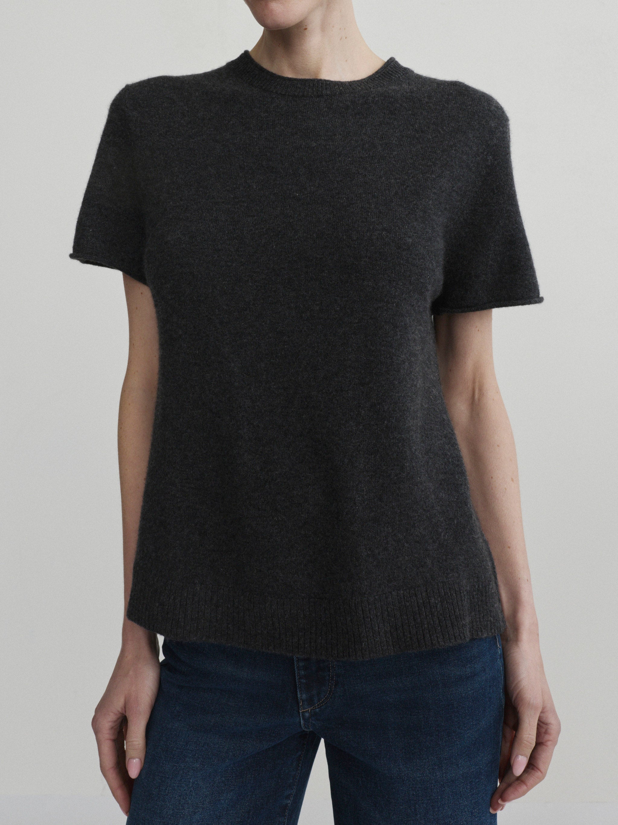 Hepburn Wide Leg jeans in Eve with Charcoal Knit Tee, model front, upper-body crop in studio.