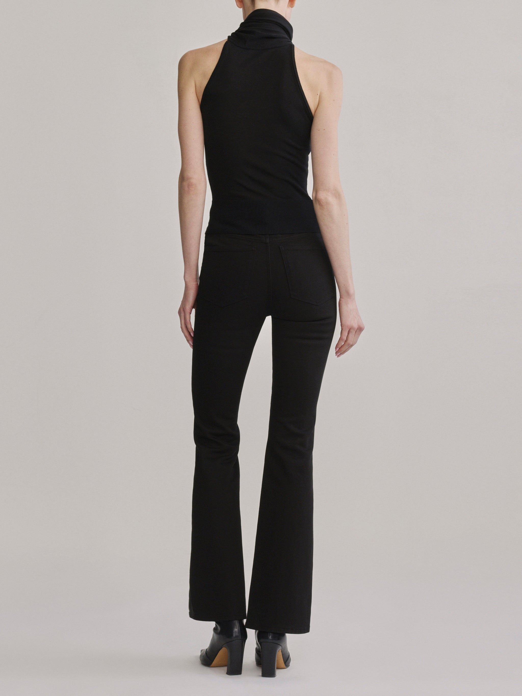 DL1961 Bridget Bootcut Instasculpt jeans in black 'Black Pintuck', back view.