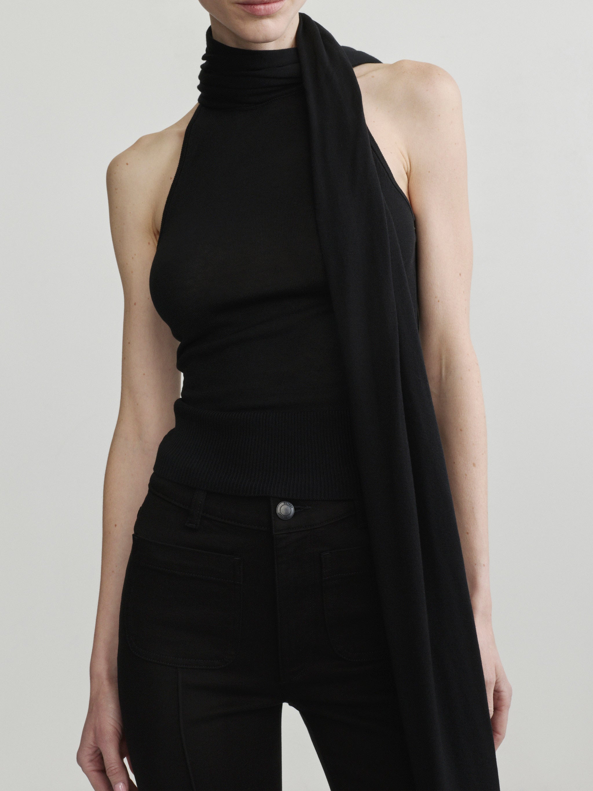 Bridget Boot jeans in Black Pintuck with Black Scarf Tie Top, model front, waist-up crop.
