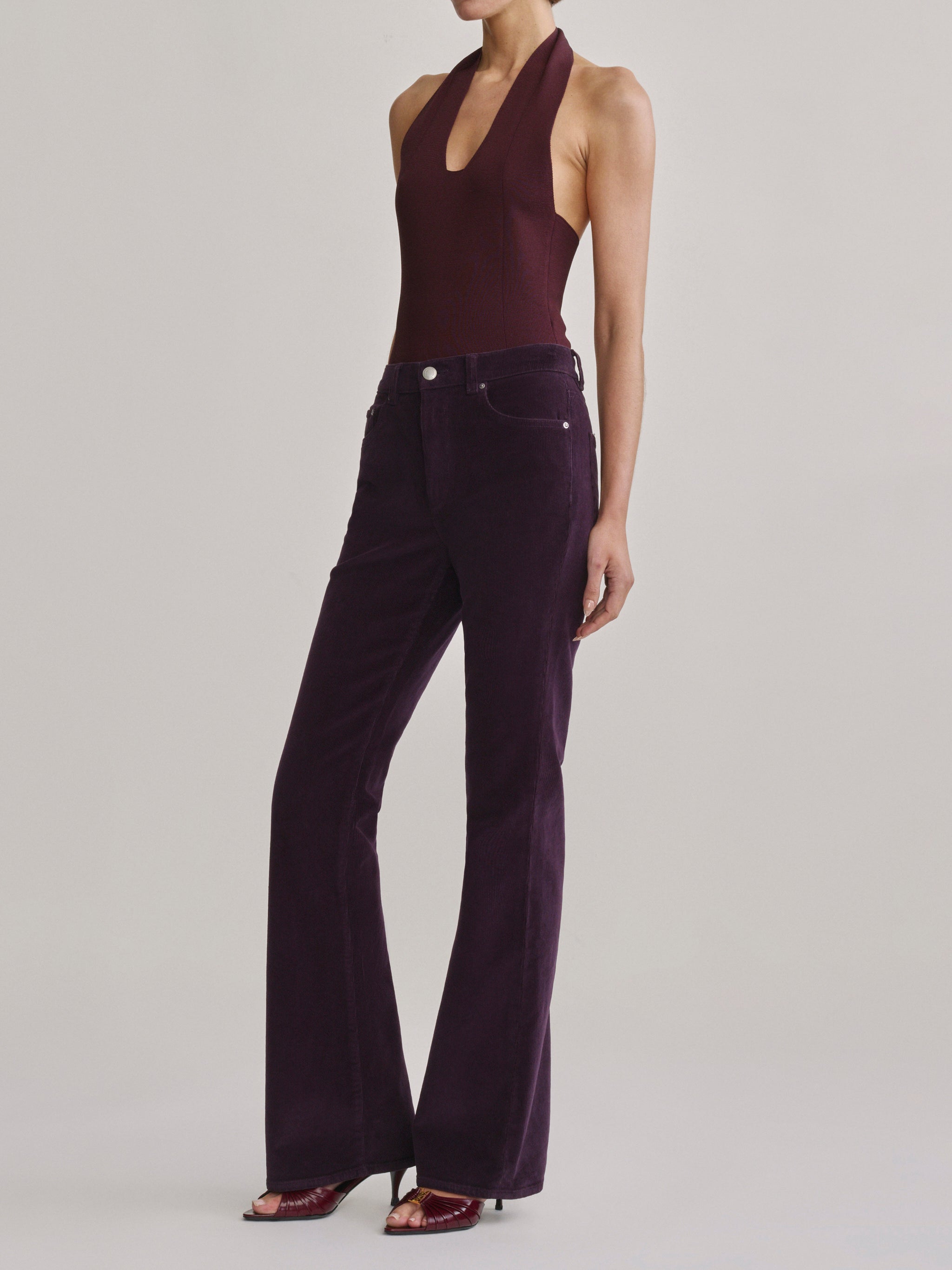 DL1961 Bridget Bootcut Instasculpt jeans in aubergine corduroy 'Blackberry Cord', three-quarter front view.