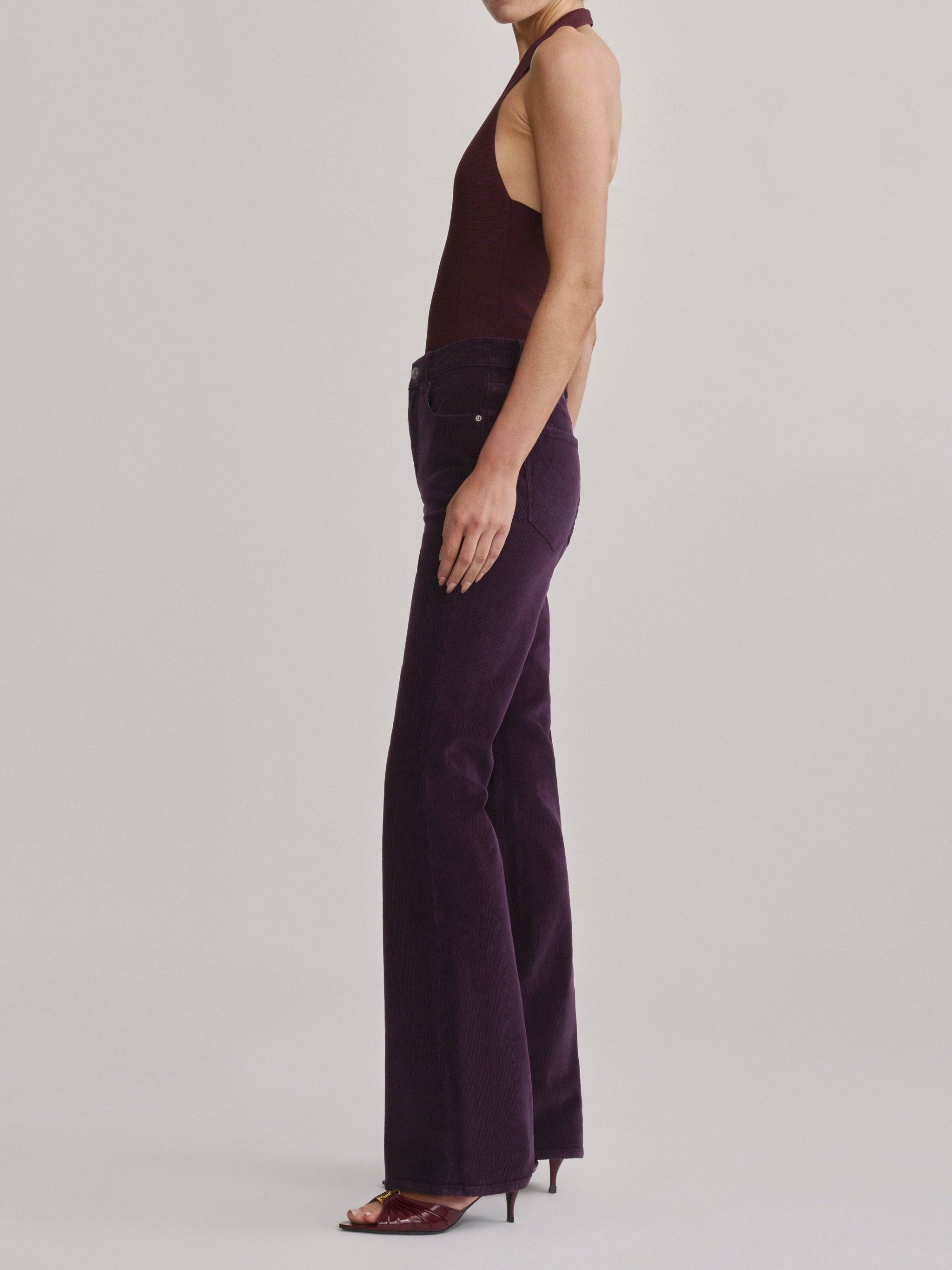 DL1961 Bridget Bootcut Instasculpt jeans in aubergine corduroy 'Blackberry Cord', side profile view.
