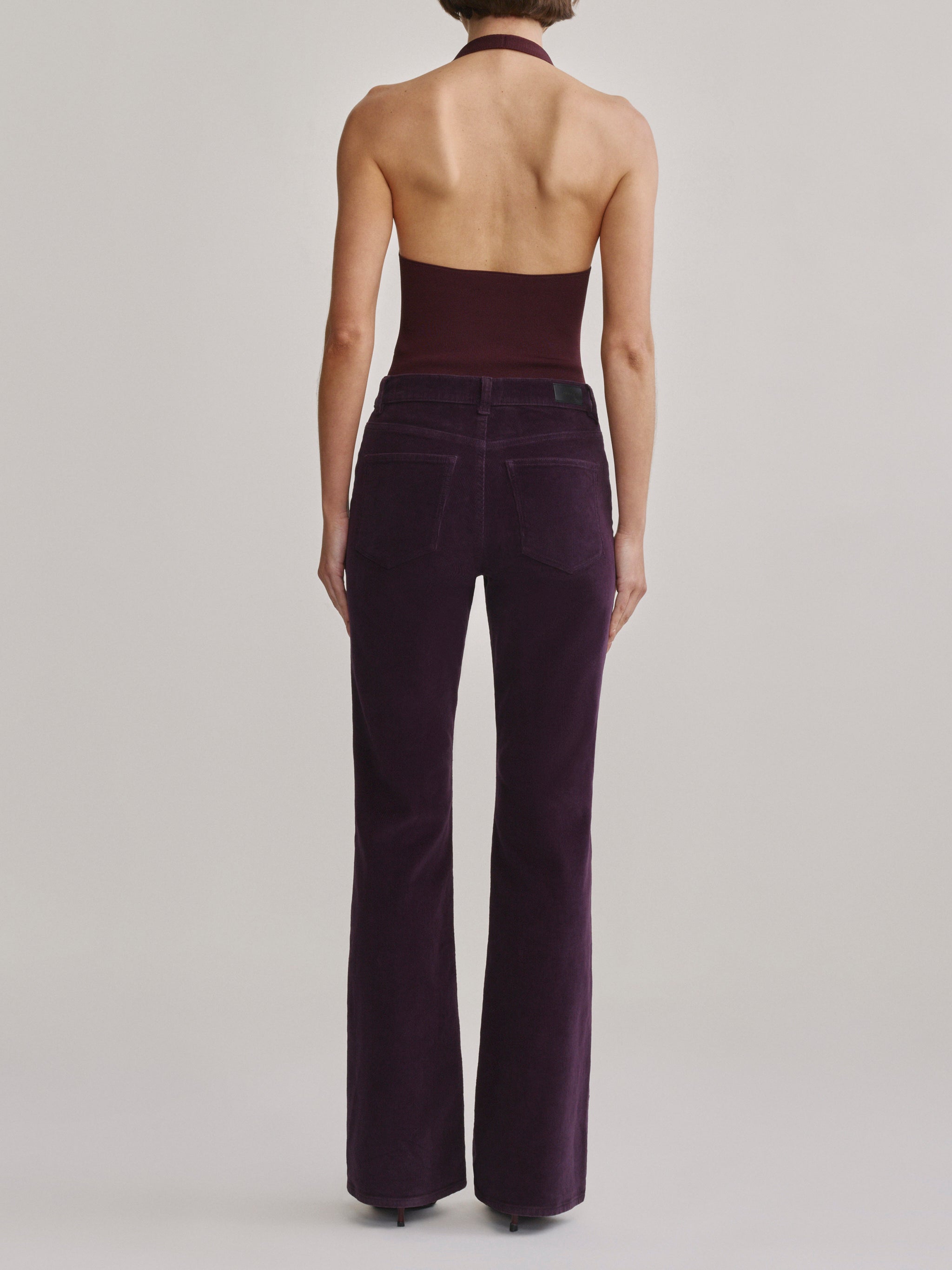 DL1961 Bridget Bootcut Instasculpt jeans in aubergine corduroy 'Blackberry Cord', back view.