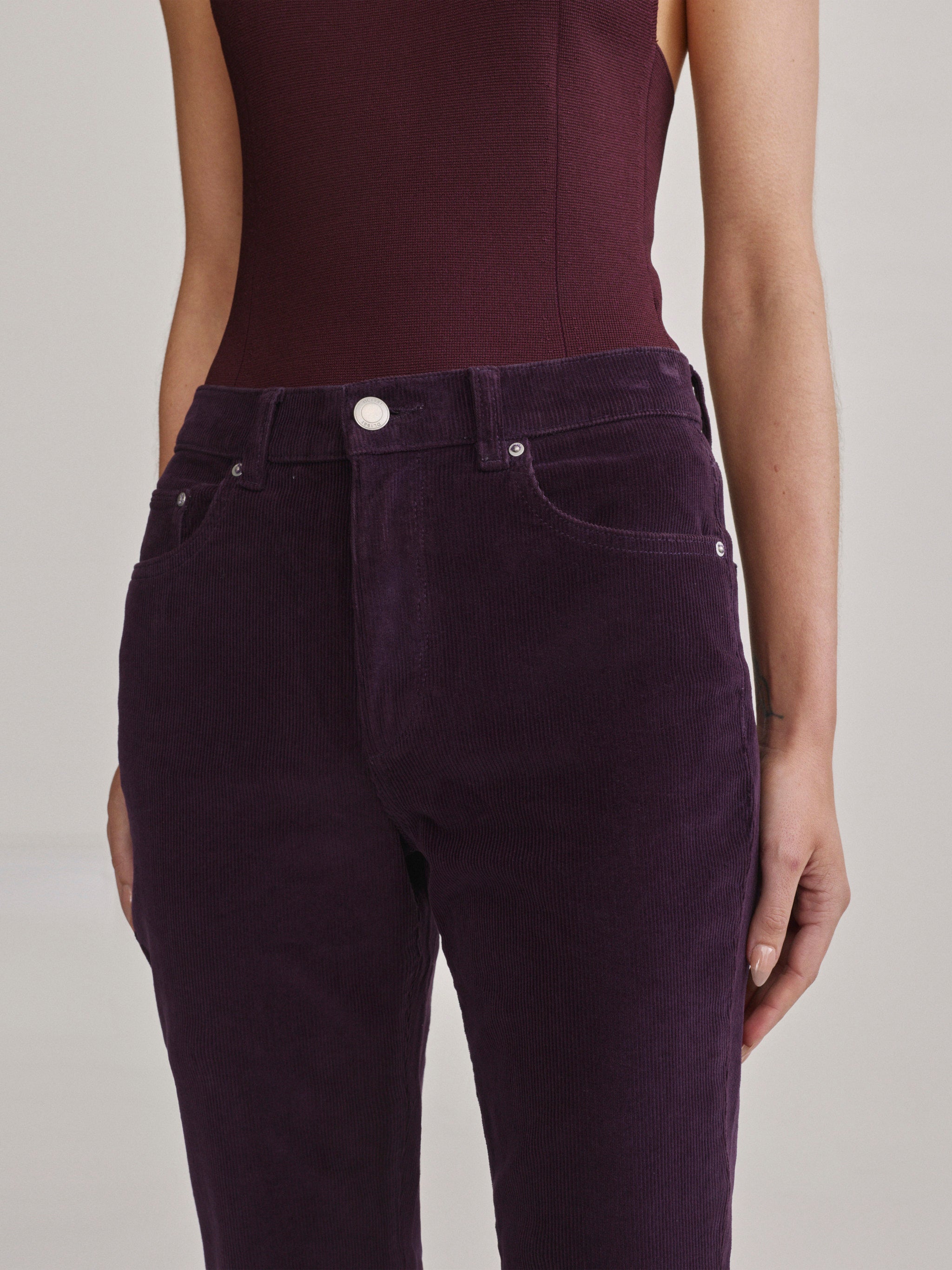 DL1961 Bridget Bootcut Instasculpt jeans in aubergine corduroy 'Blackberry Cord', corduroy wale and front pocket detail.