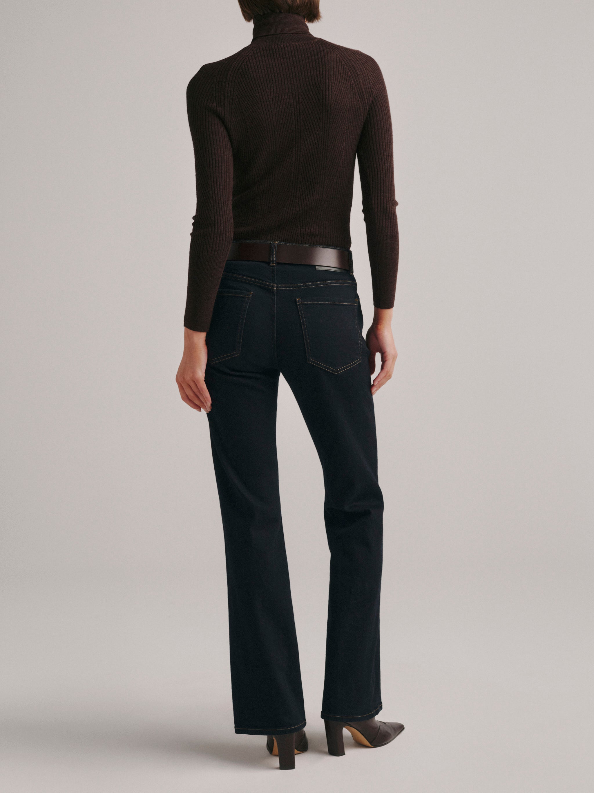 DL1961 Bella Slim Bootcut mid-rise jeans in dark indigo rinse 'Harvest Moon', back view, full-length.
