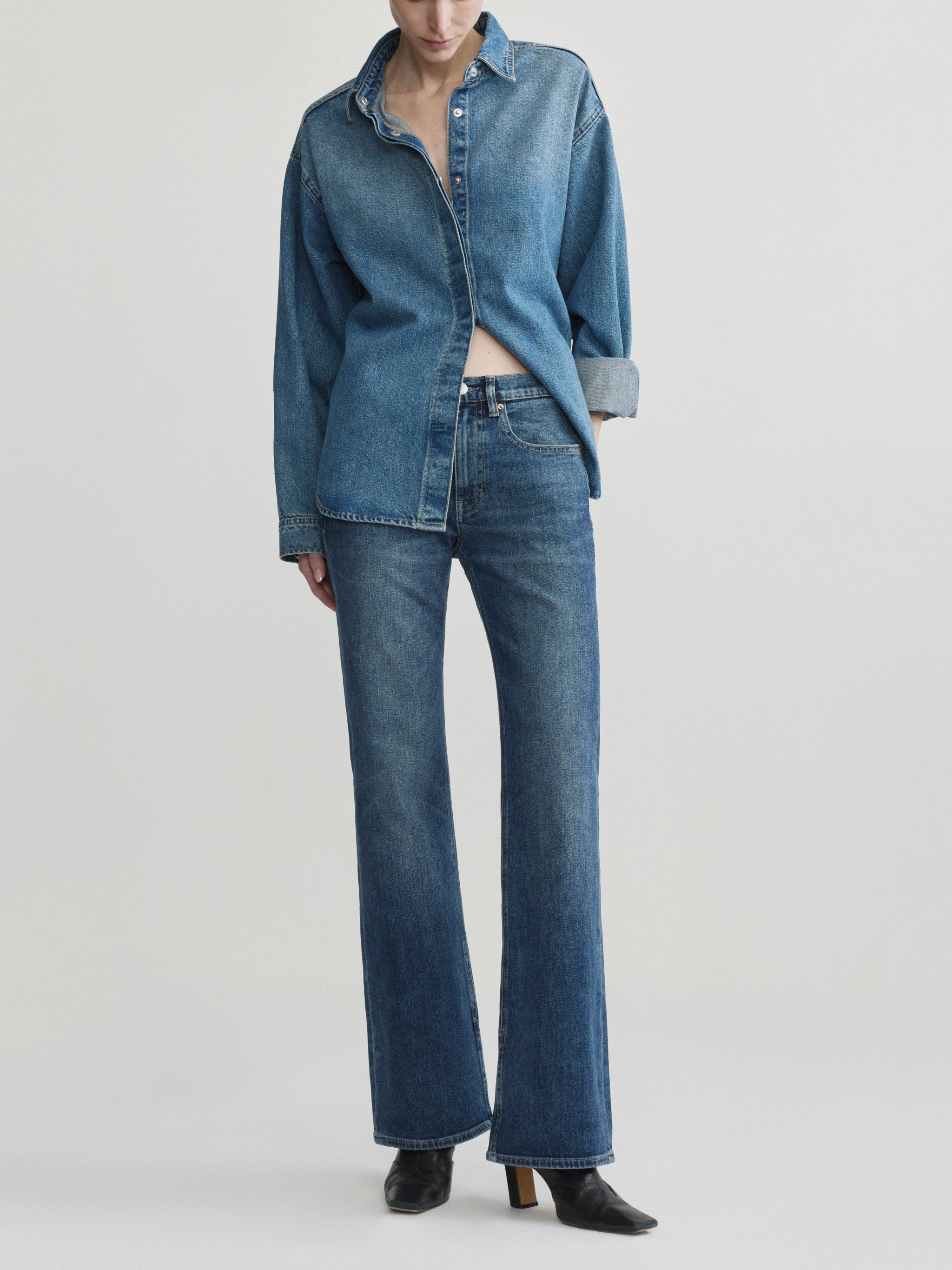 Bella jeans in Quiet with Endless Sea Addison Overshirt, model standing, full-length front view.