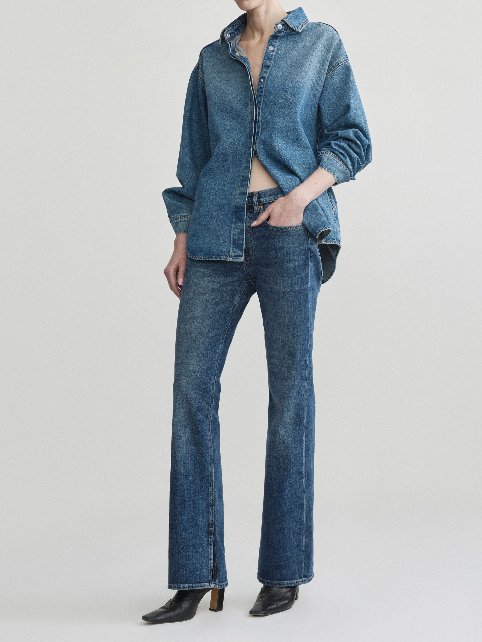 Bella jeans in Quiet with Endless Sea Addison Overshirt, model three-quarter view, full-length.