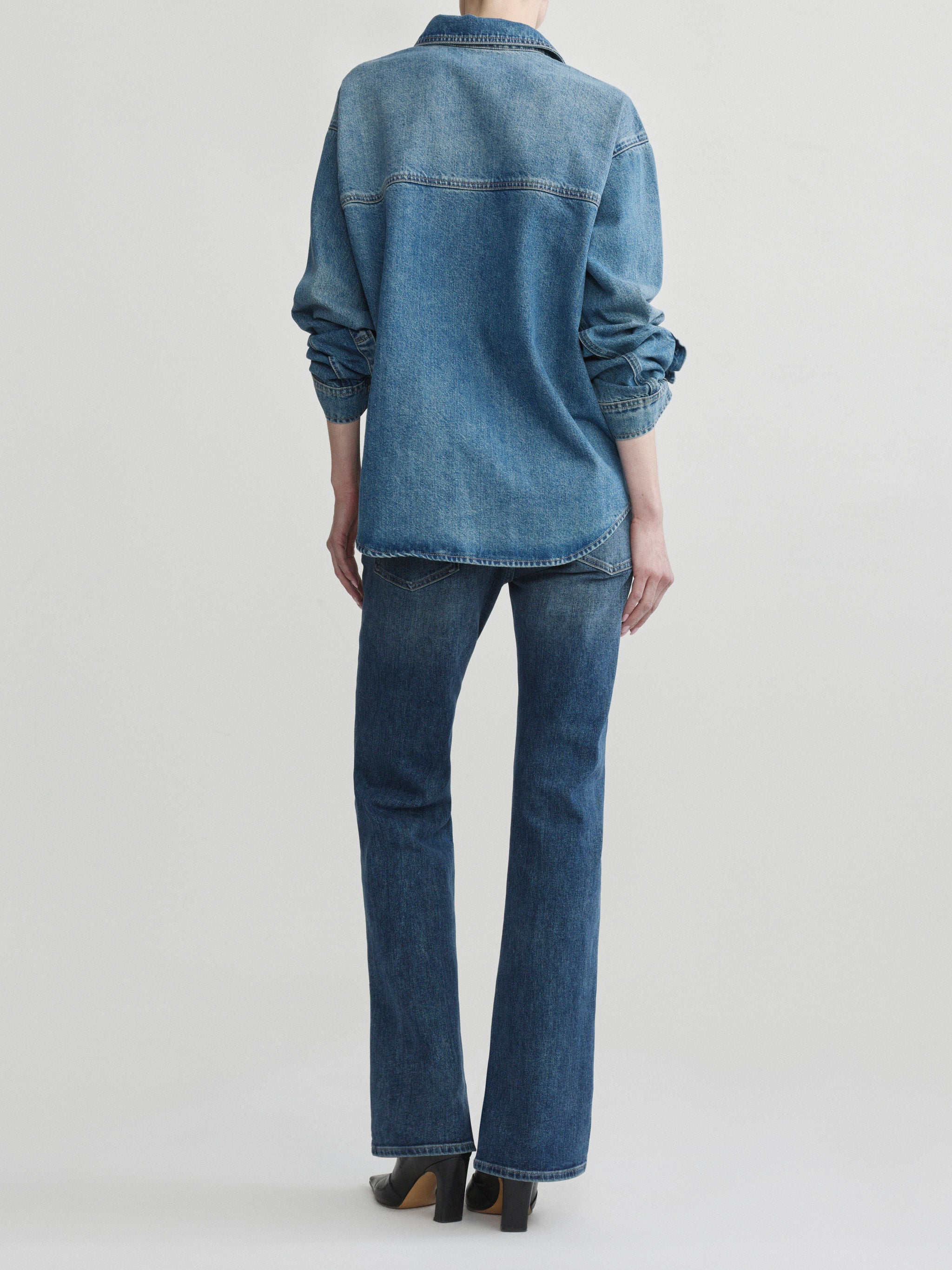 Bella jeans in Quiet with Endless Sea Addison Overshirt, model back view, full-length.