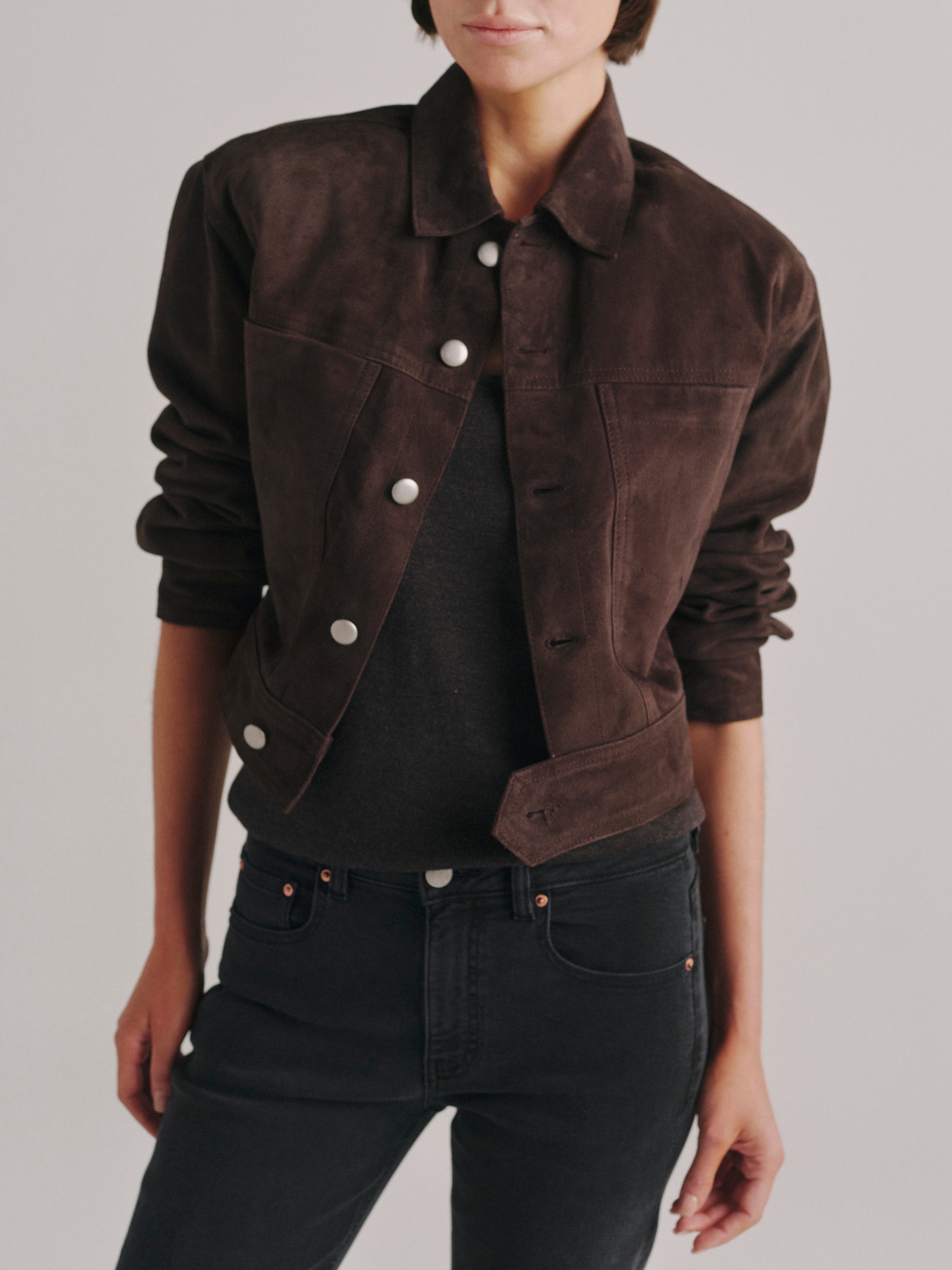 DL1961 Alina Suede Jacket in tobacco brown suede, cropped snap-front, open over gray knit, front detail.