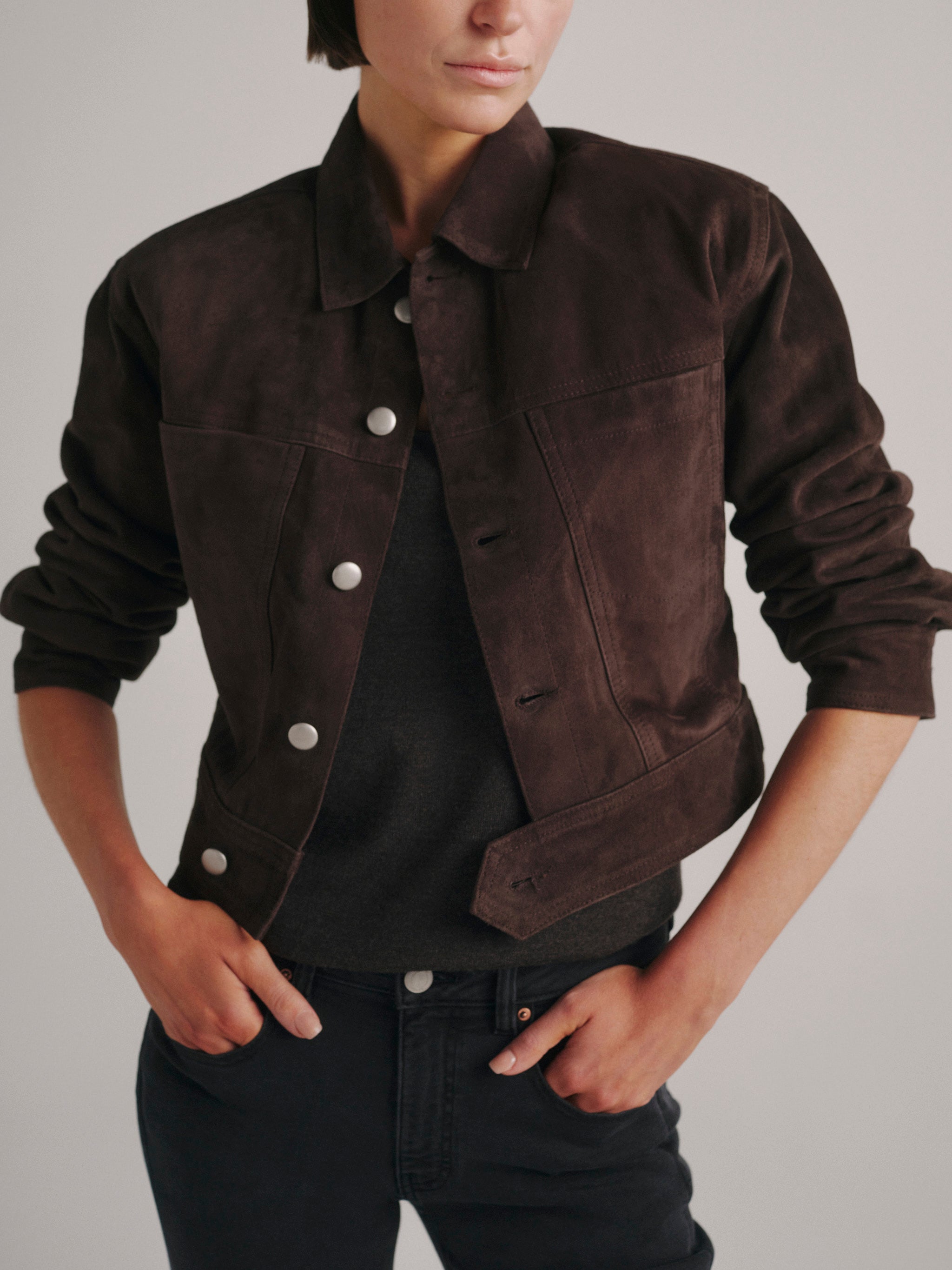 DL1961 Alina Suede Jacket in tobacco brown suede, cropped snap-front, worn open, close front detail.