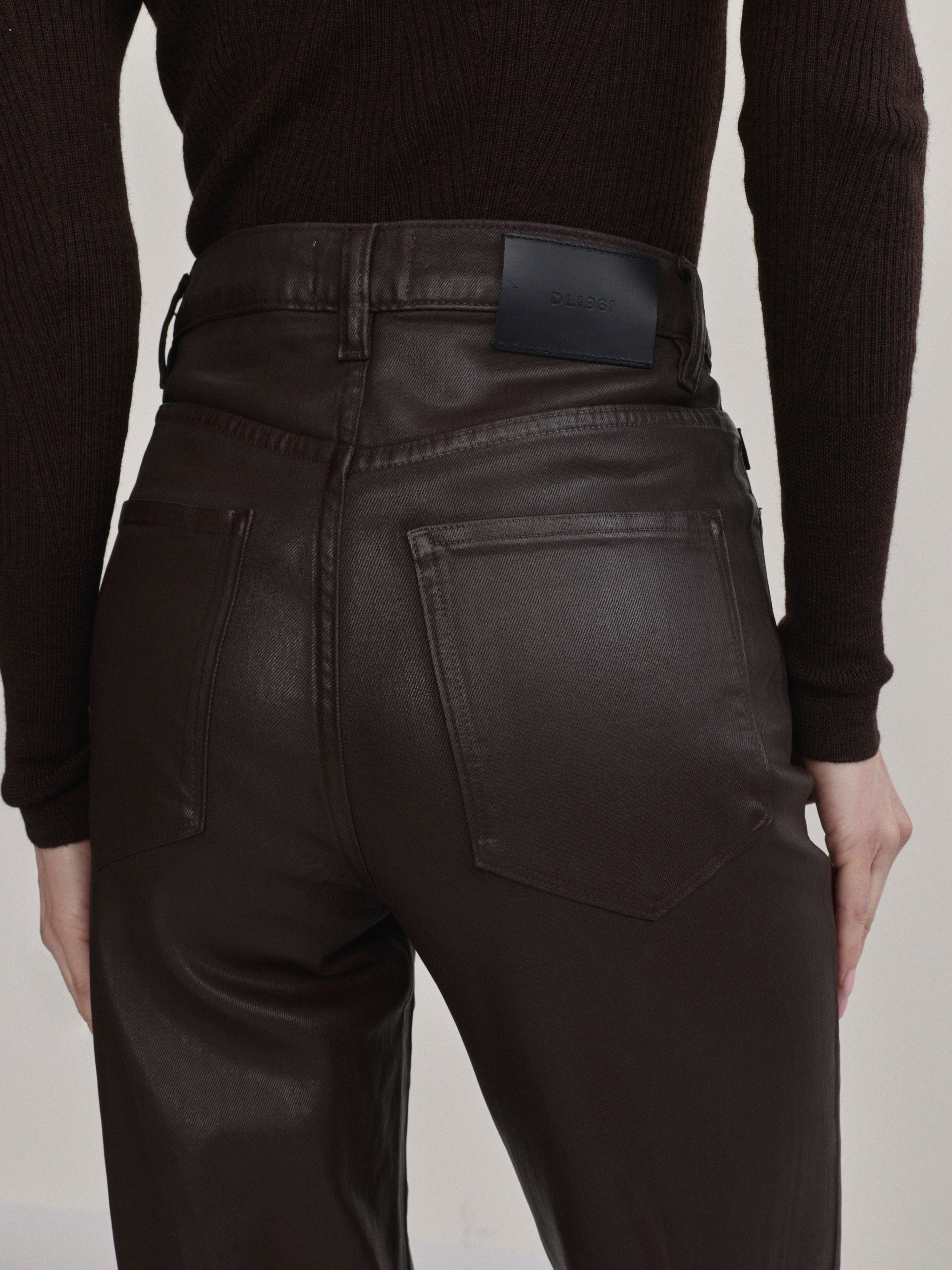 DL1961 Karmine wide-leg high-rise jeans in coated dark berry-brown 'Bramble Coated', back pocket close-up.