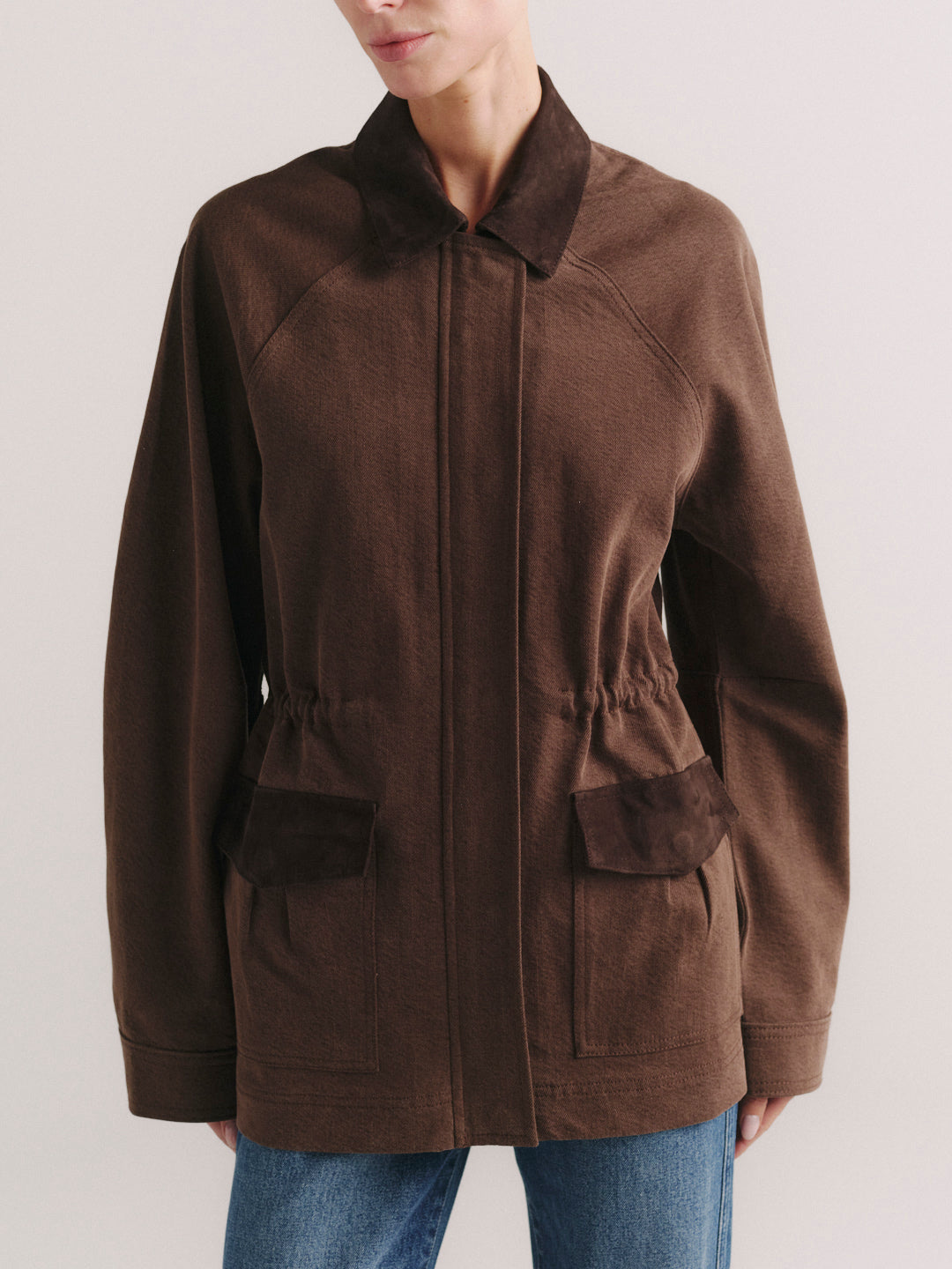 Cate Slim jeans in Mid Dark with Brownstone Field Jacket, model front, waist-up crop in studio.
