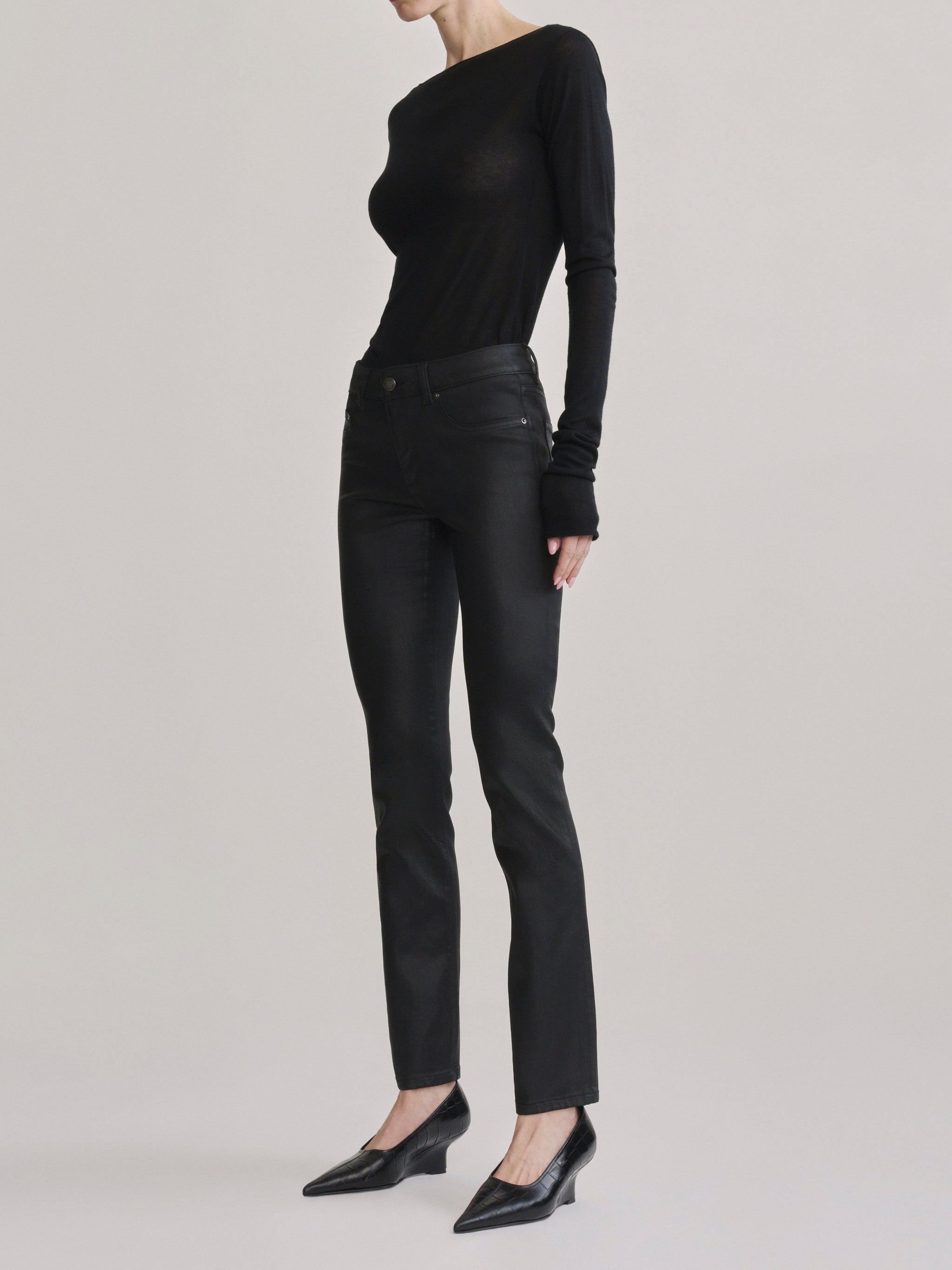 DL1961 Jessica Skinny Low-Rise coated jeans in Black Coated, glossy finish, angled front view.