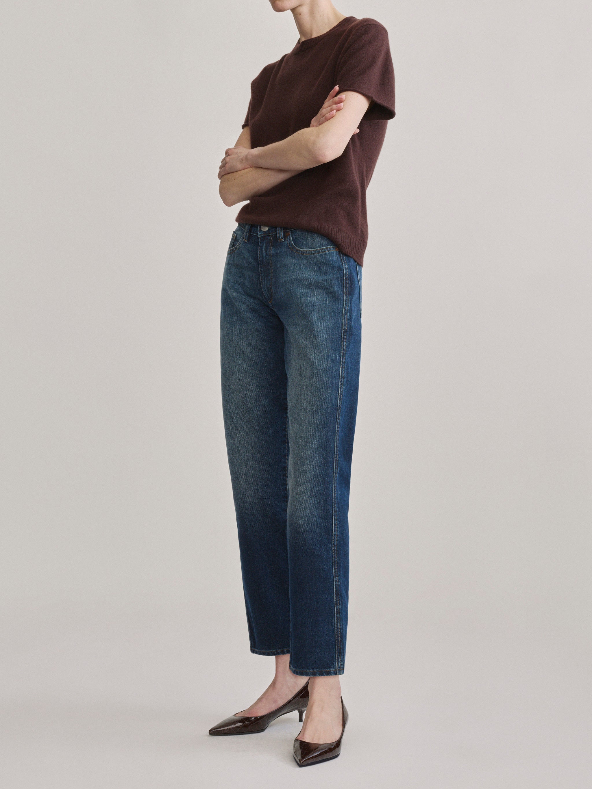 DL1961 Dakota slim straight low-rise jeans in medium blue 'Drama', three-quarter view of the straight leg.