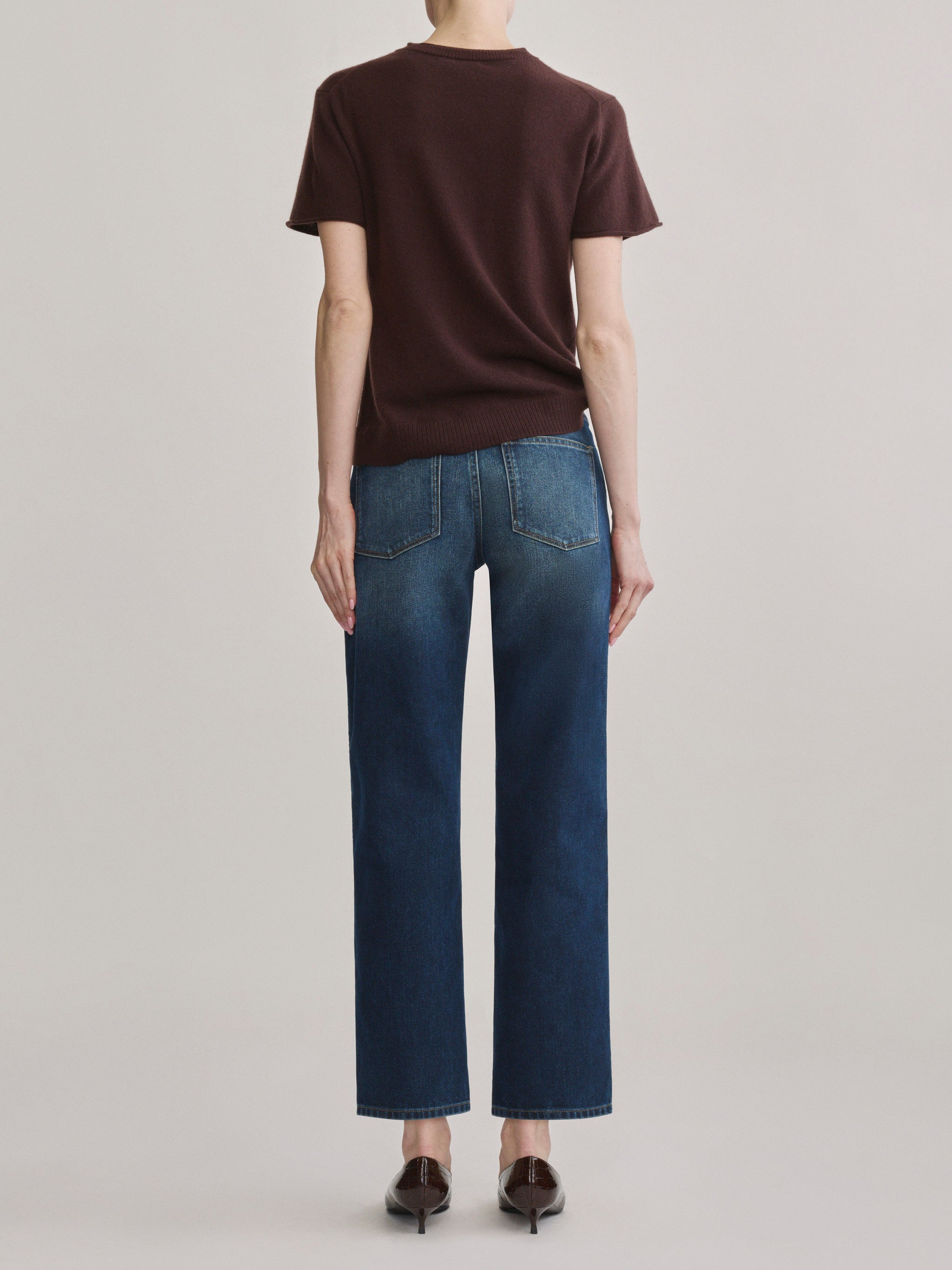 DL1961 Dakota slim straight low-rise jeans in medium blue 'Drama', back view showing straight-leg fit.