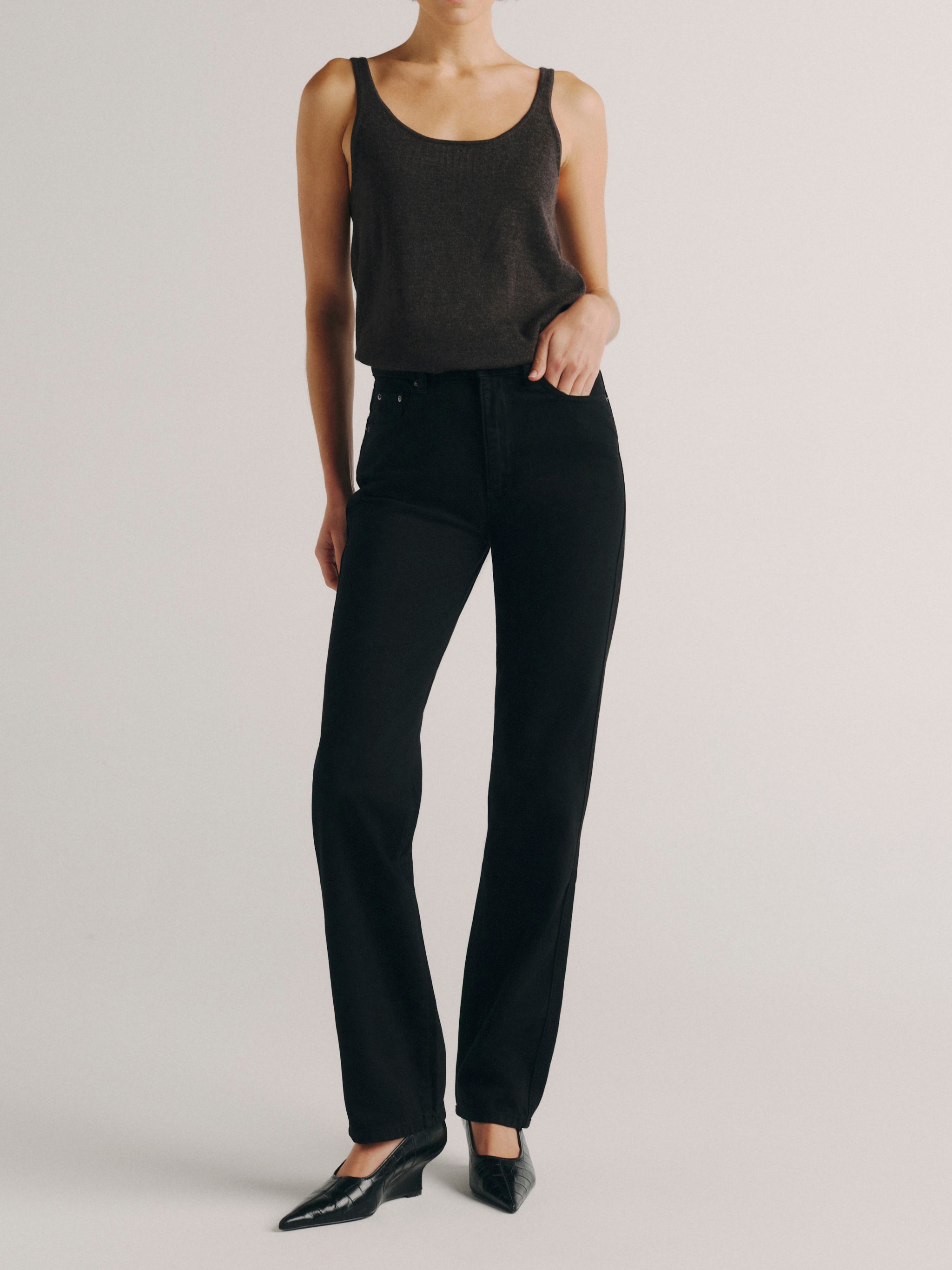 DL1961 women's Cate Classic Straight high rise jeans in black, front view styled with a charcoal tank and black heels.