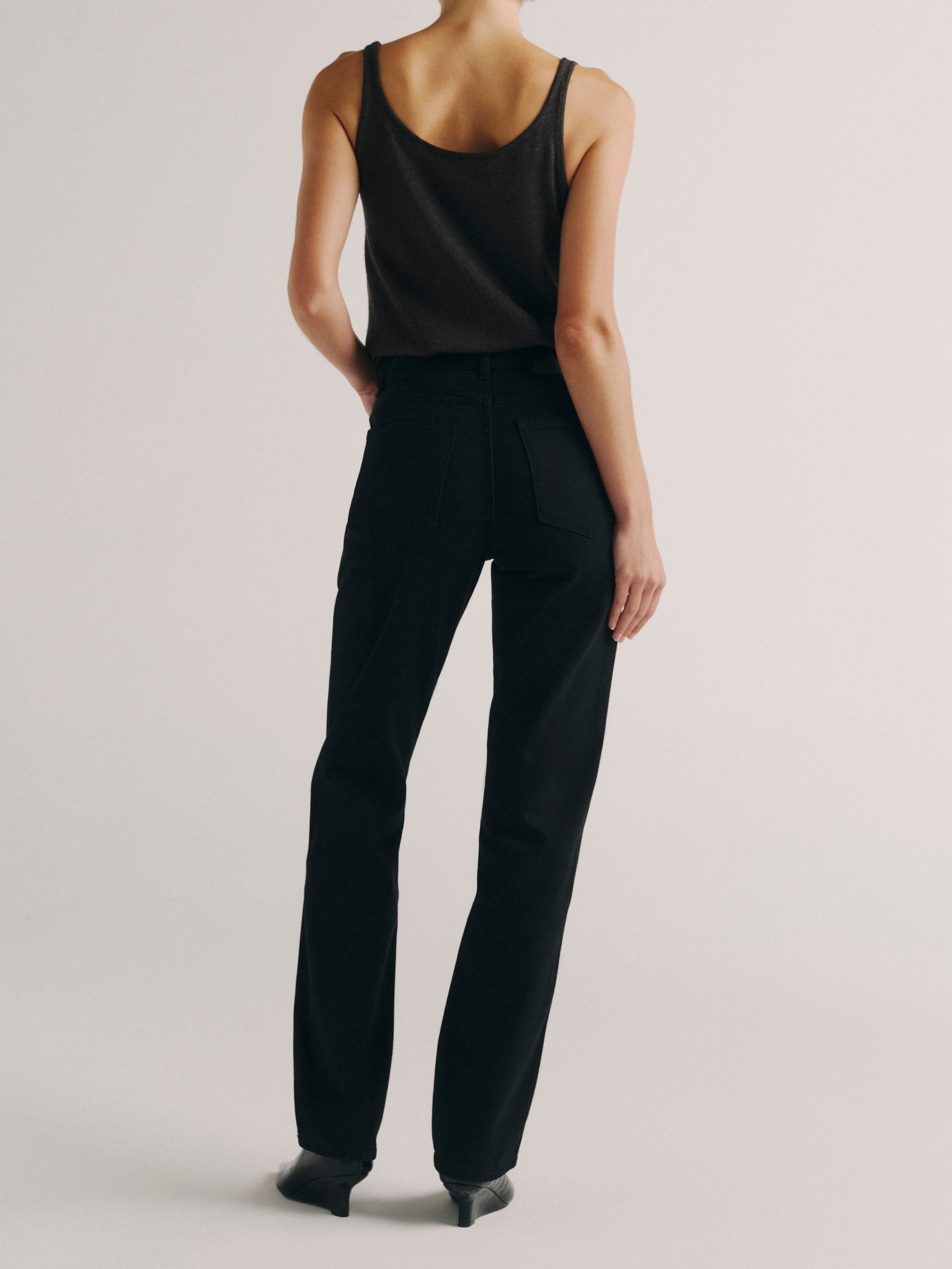 DL1961 women's Cate Classic Straight high rise jeans in black, back view showing the rear pockets and straight leg.