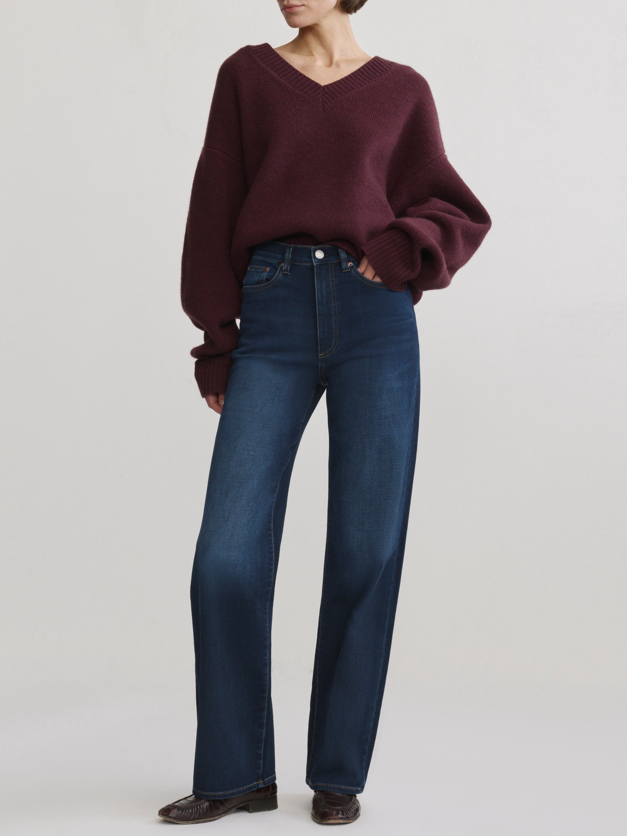 DL1961 Karmine Refined Wide Leg High-Rise Jeans in Newport Softwear — front view, hand in pocket