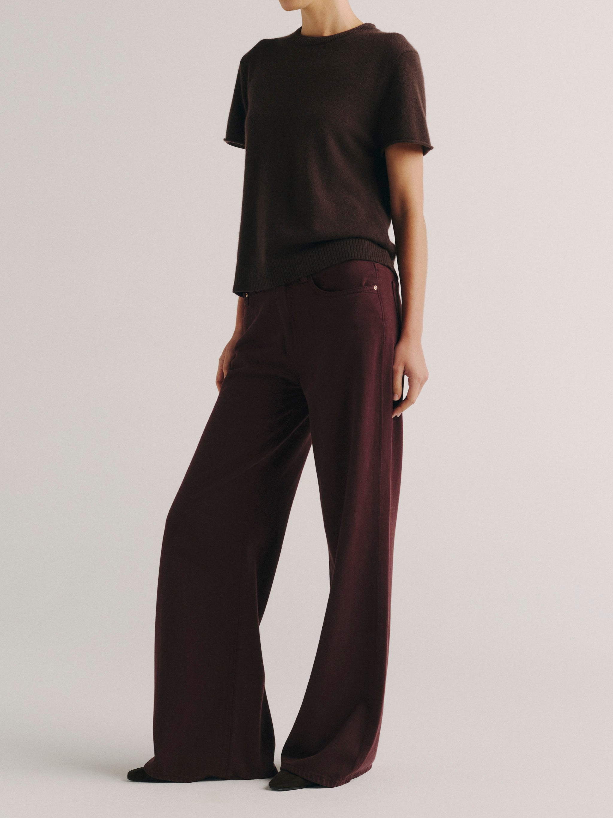 DL1961 women's Alex Baggy Wide Leg jeans in deep burgundy 'Bordeaux Aura', three-quarter front view showing the wide leg.