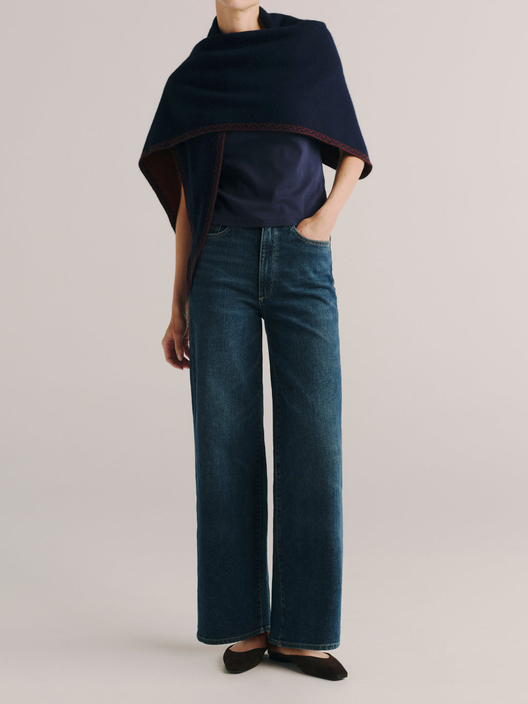 DL1961 Hepburn wide-leg jeans in dark indigo 'Eve', full-length front view with navy knit wrap