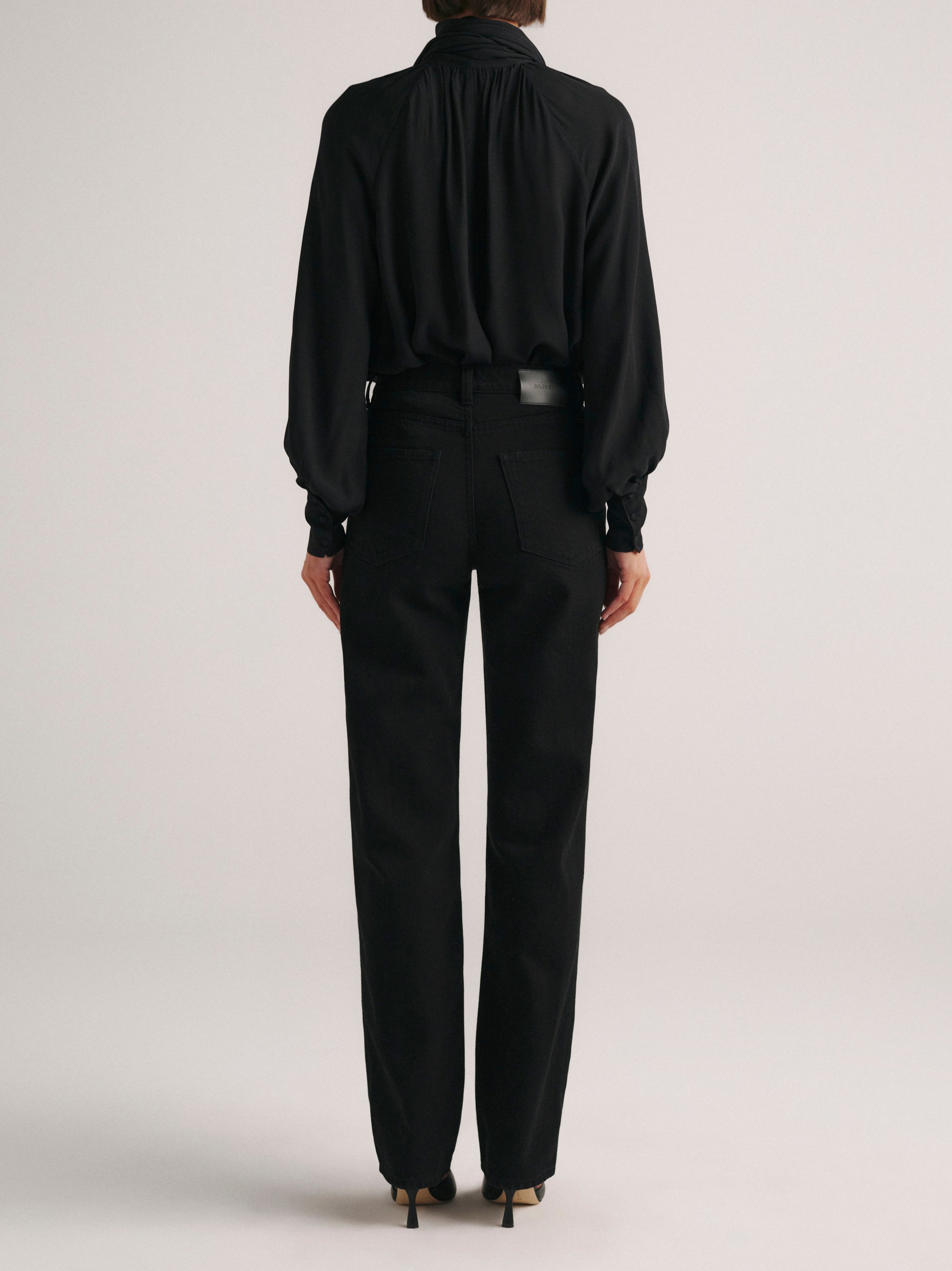 DL1961 Cate Classic Straight petite jeans in black 'Black', back view.