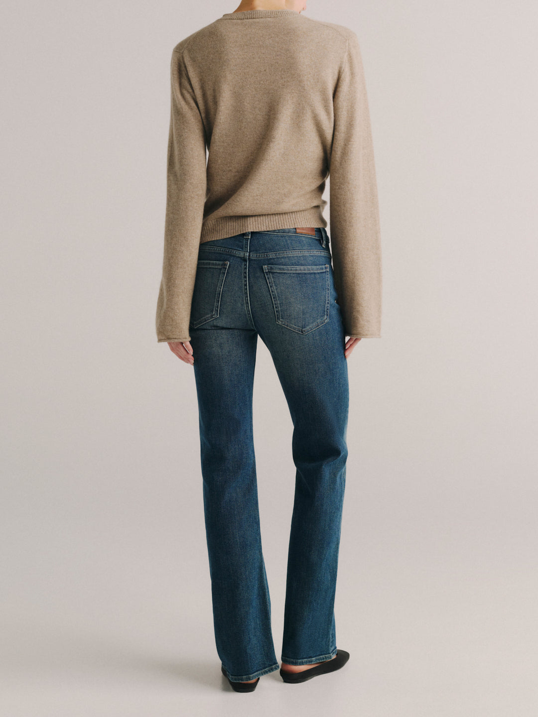 DL1961 Bella Slim Bootcut mid-rise jeans in faded medium-blue 'Deep Willow', back view, full-length.