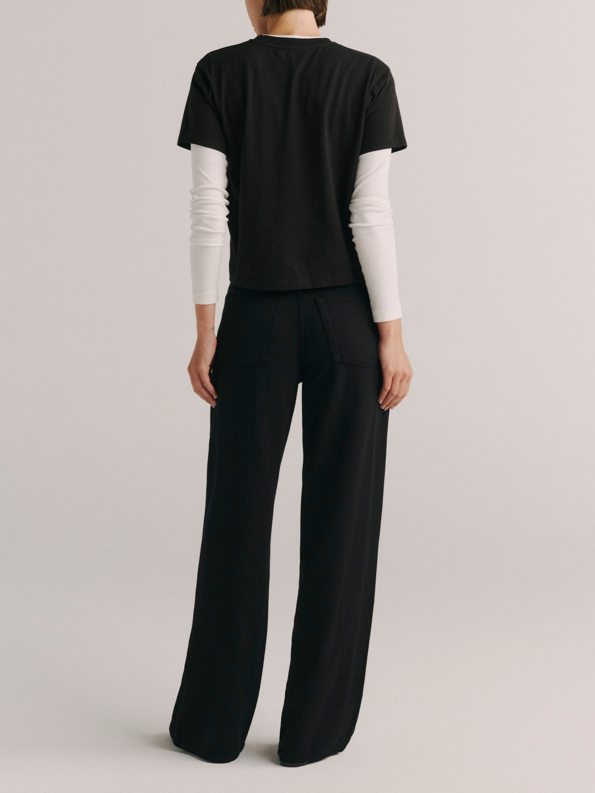 DL1961 women's Sienna Low-Slung Drawstring Wide Leg jeans in black 'Black Aura', back view showing the wide leg.