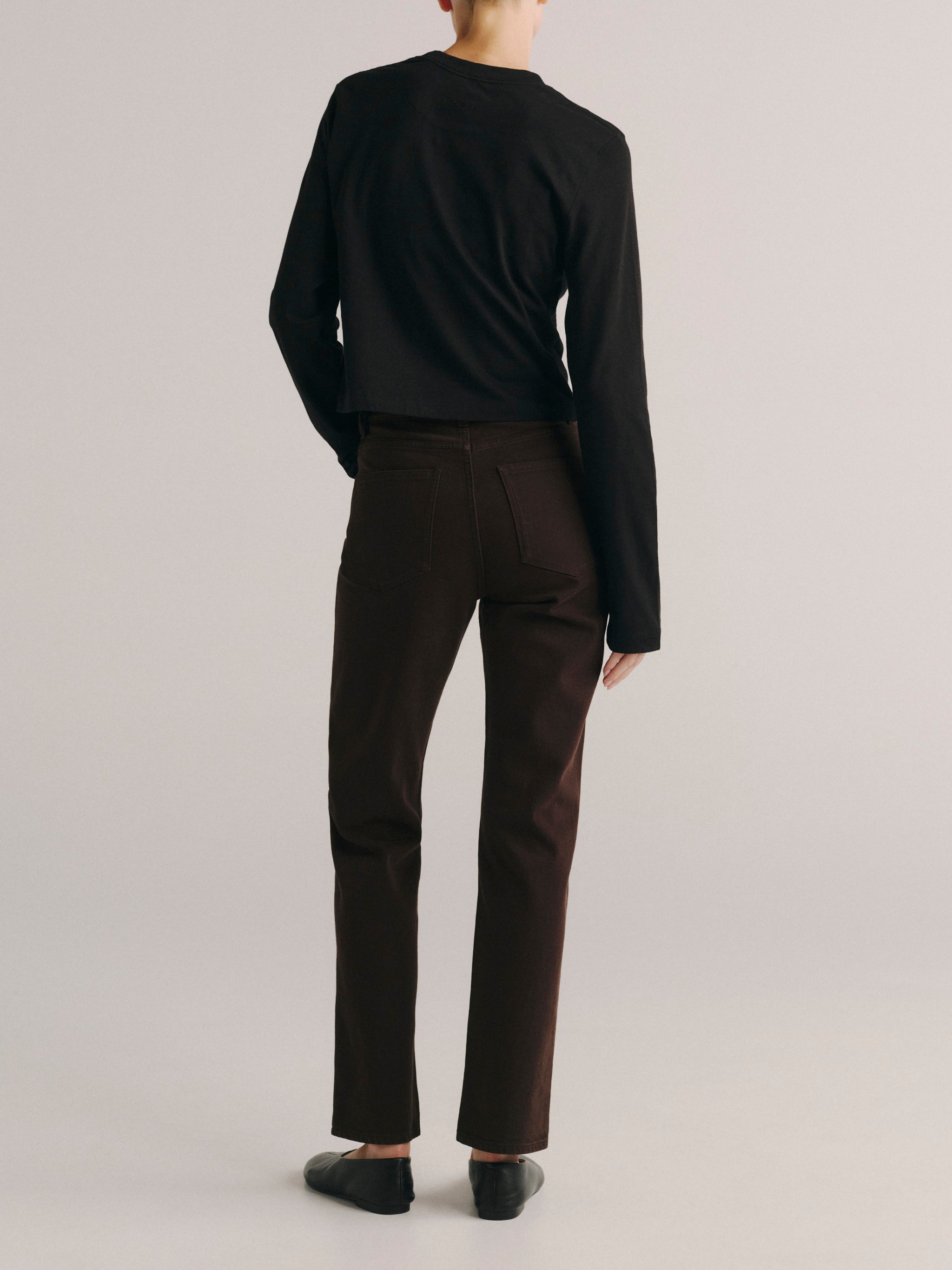 DL1961 women's Cate Stretch Straight High-Rise jeans in dark brown 'Tobacco', back view showing the rear pockets.