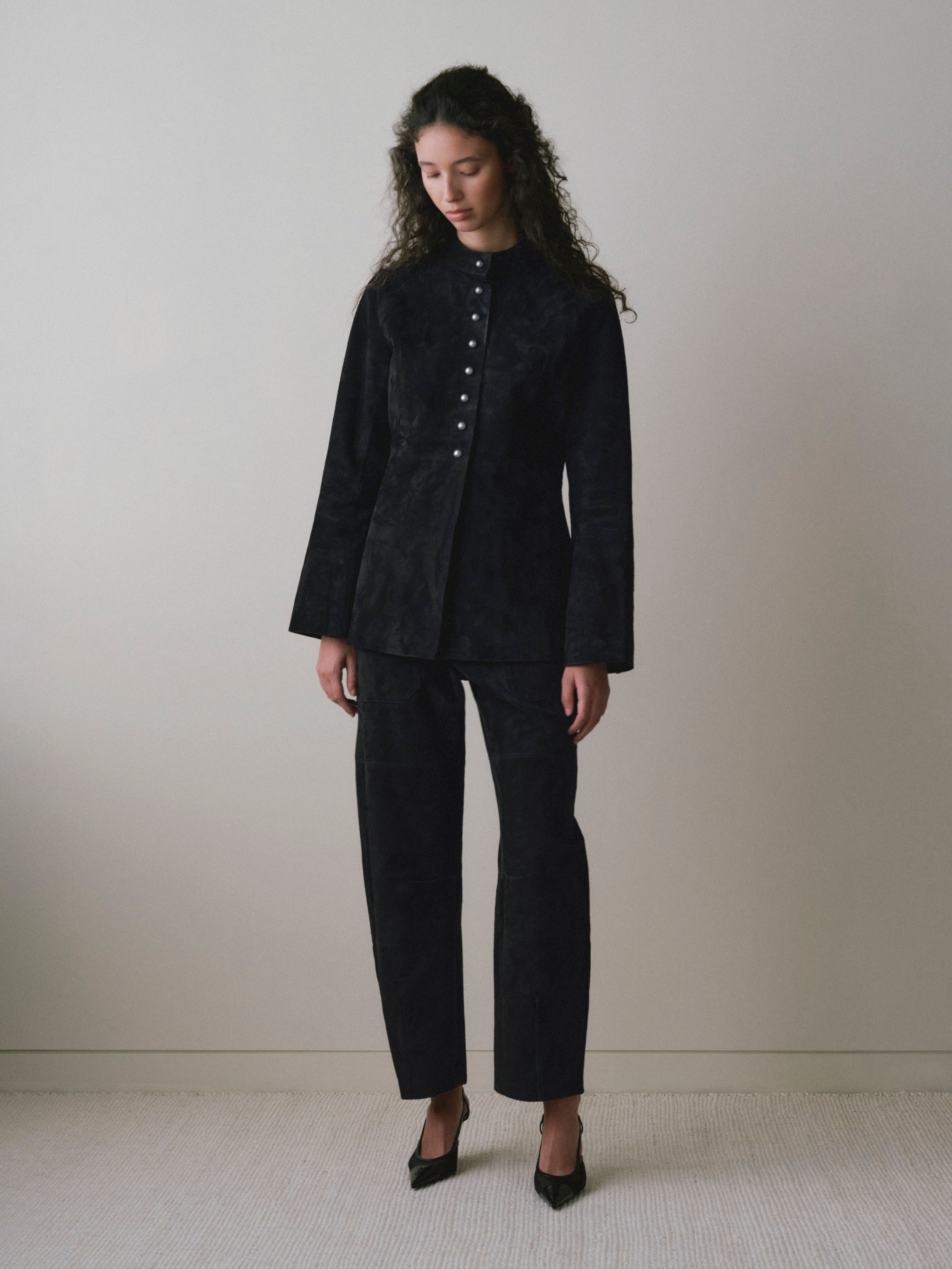 DL1961 women's Maria suede jacket in black, full-length front view with black suede barrel pants.