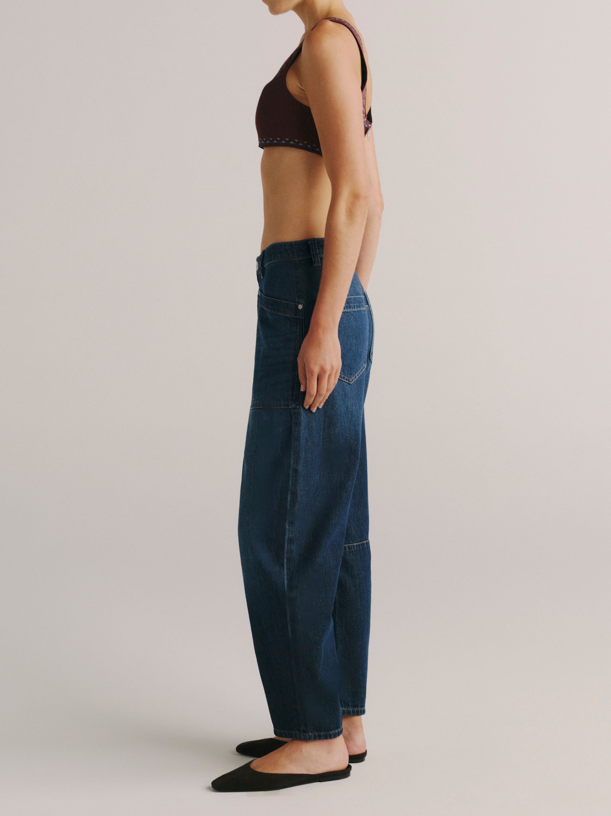 DL1961 women's Colette denim bralette in 'Burgundy Embroidery', side view showing the fitted cut.