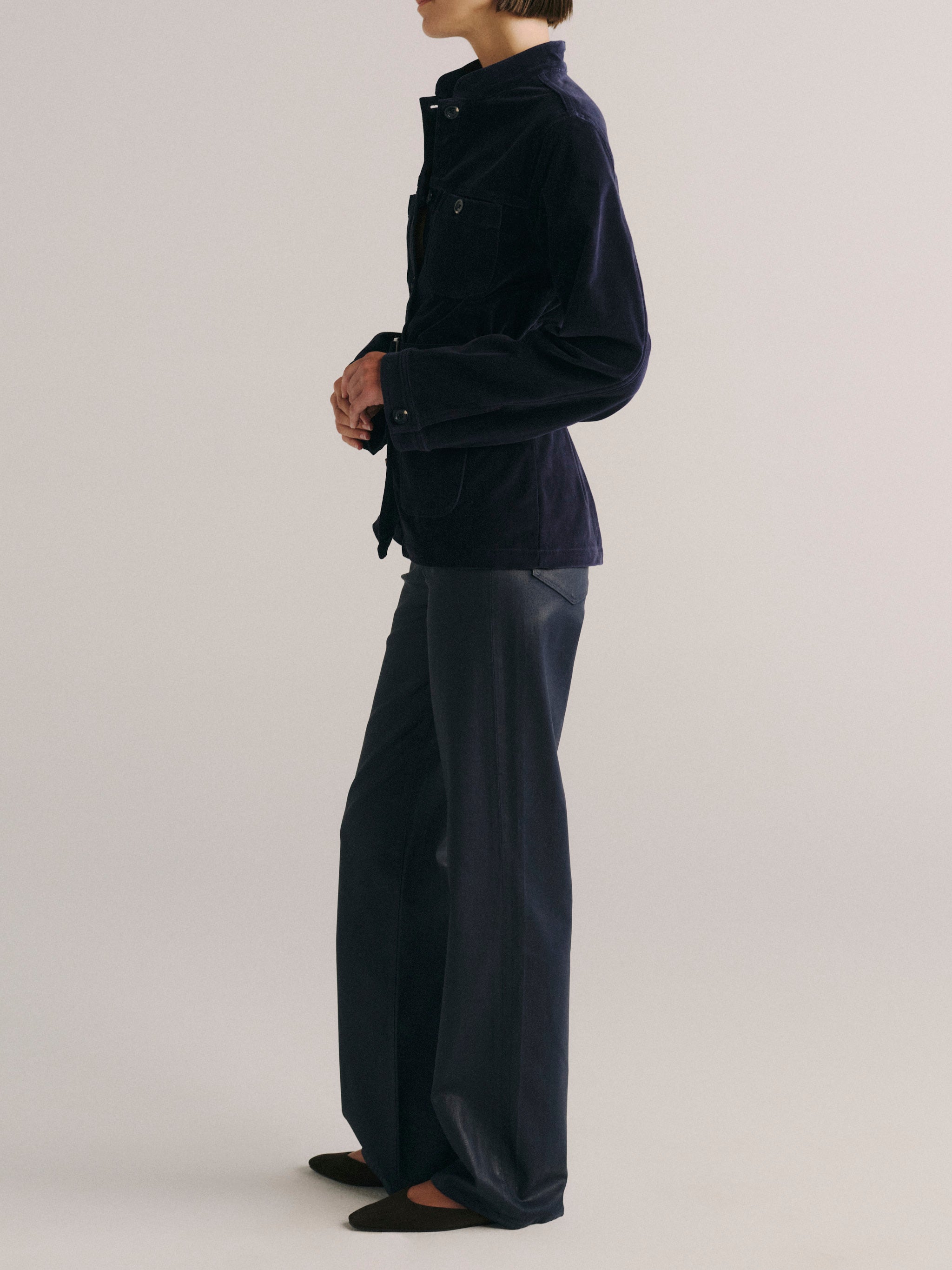 DL1961 women's Utility velvet jacket in navy 'Ajax Velvet', side view showing the belted silhouette.